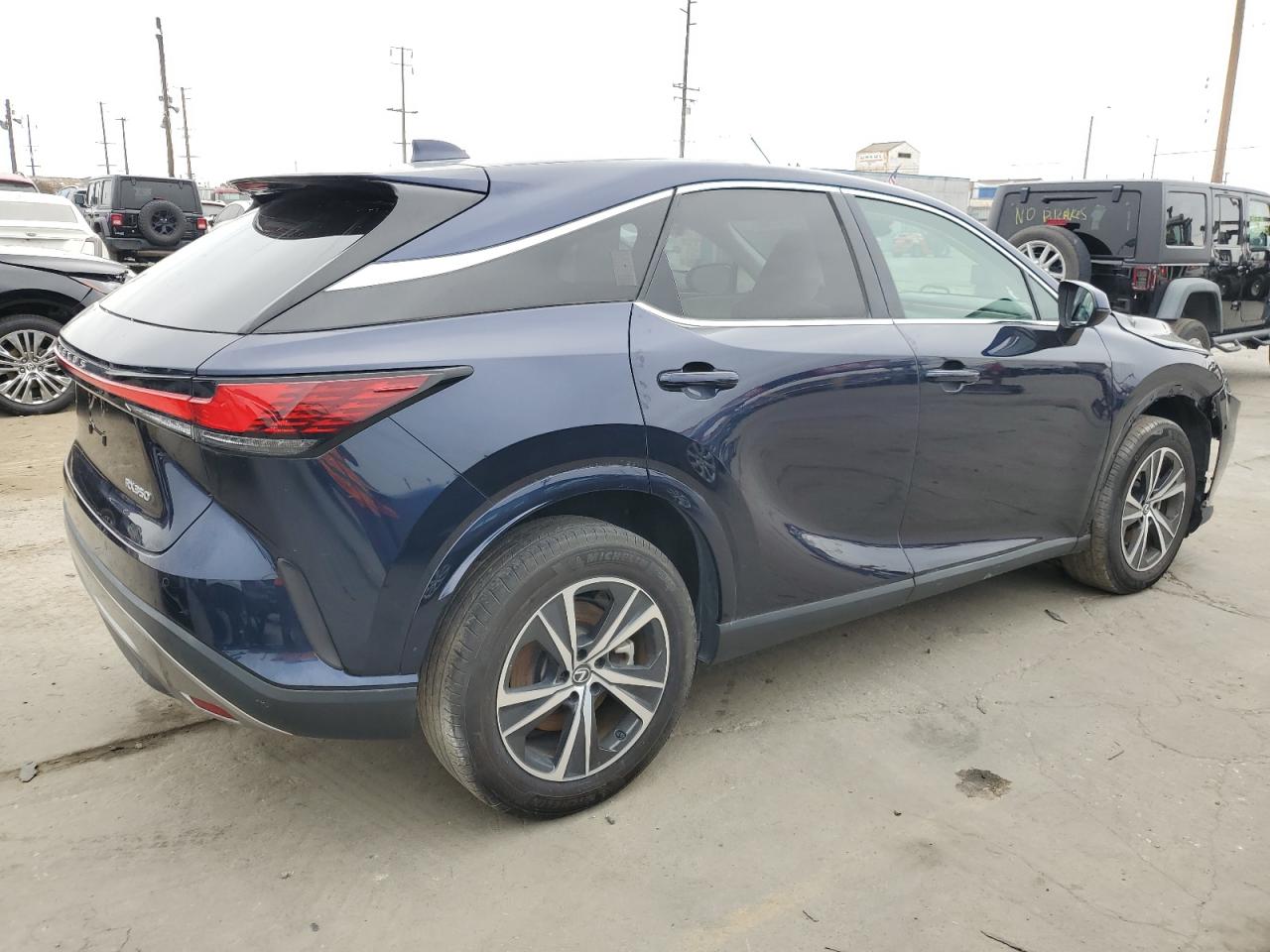 2023 Lexus RX VIN 2T2BAMBA6PC007002 Copart auction photo, front end / side damage thumbnail 3