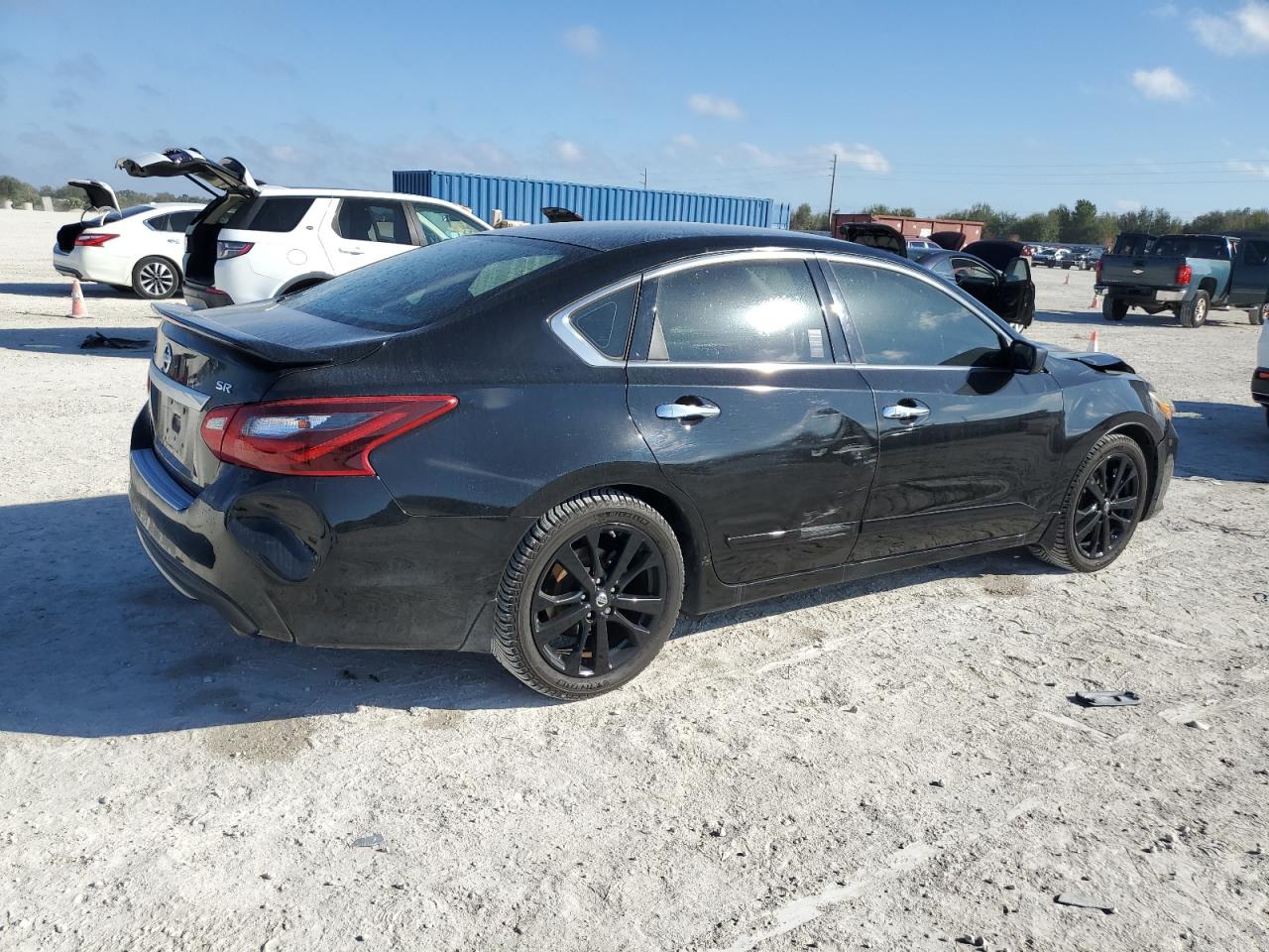2017 Nissan Altima VIN 1N4AL3AP2HC273403 Copart auction photo, front end / side damage thumbnail 3