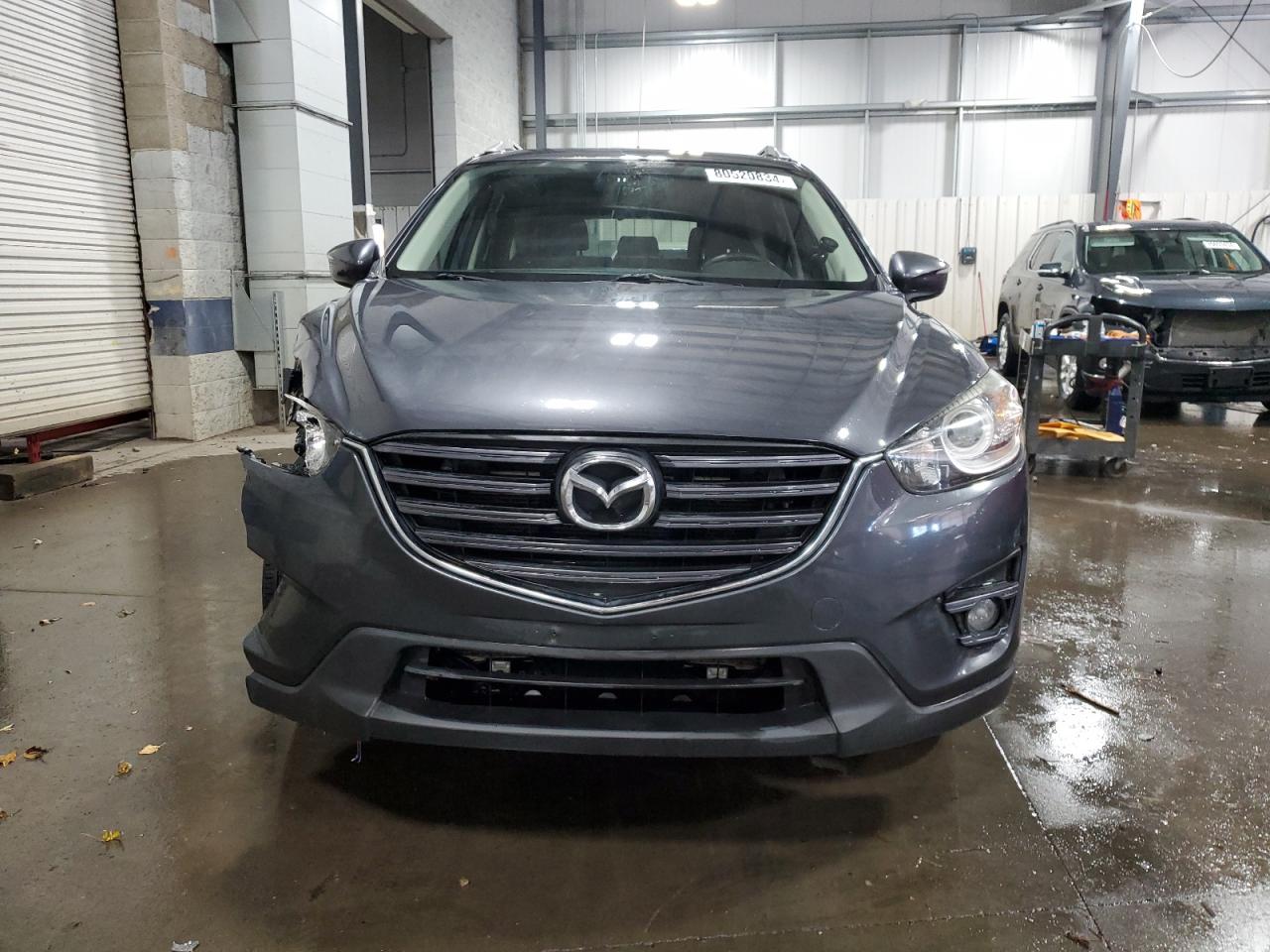 2016 Mazda CX-5 VIN JM3KE4CY8G0699737 Copart auction photo, front end damage thumbnail 5
