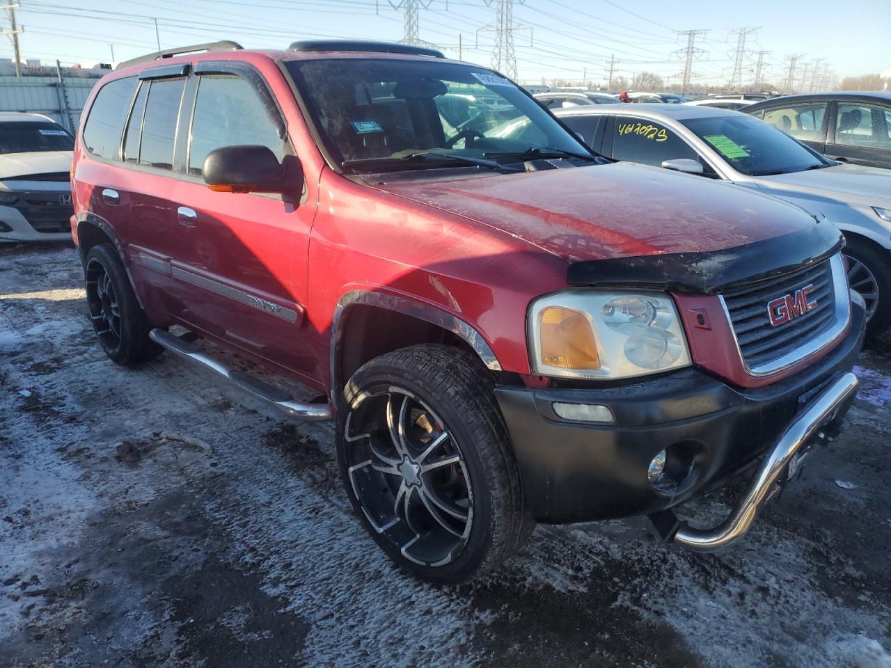 2002 GMC Envoy VIN 1GKDT13S922111587 Copart auction photo, front end / minor dent/scratches damage thumbnail 4