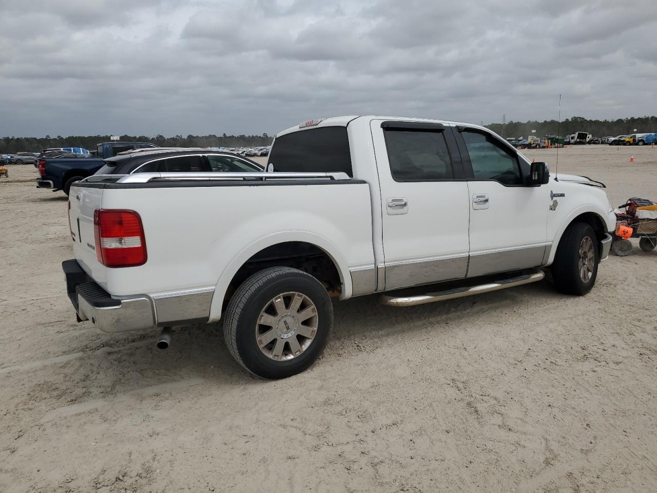 2006 Lincoln Mark LT VIN 5LTPW16506FJ14055 Copart auction photo, front end / all over damage thumbnail 3