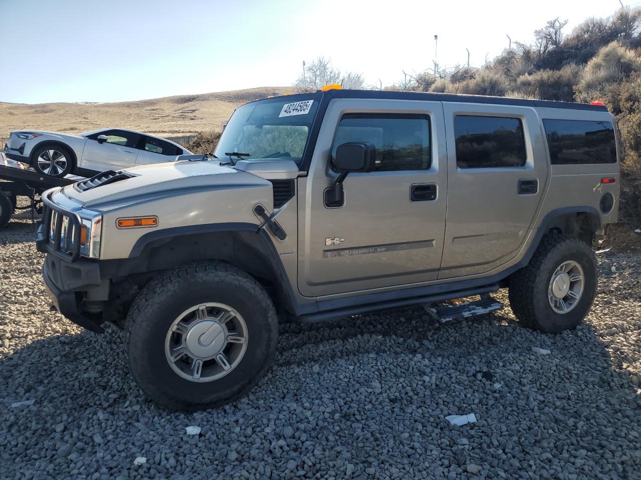 2003 Hummer H2 VIN 5GRGN23UX3H140703 - Copart auction photo