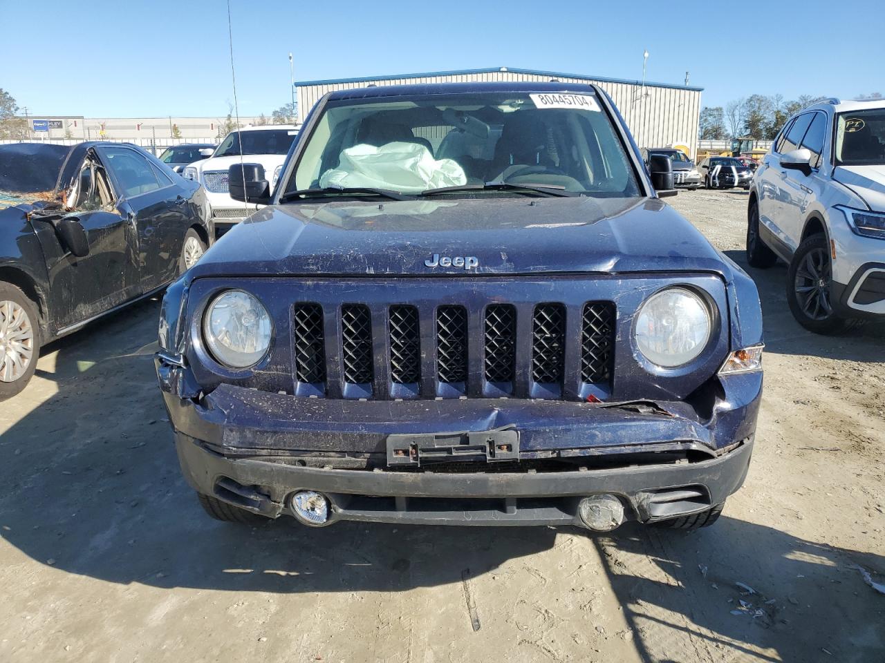 2014 Jeep Liberty (Patriot) VIN 1C4NJRFB0ED694284 Copart auction photo, front end damage thumbnail 5