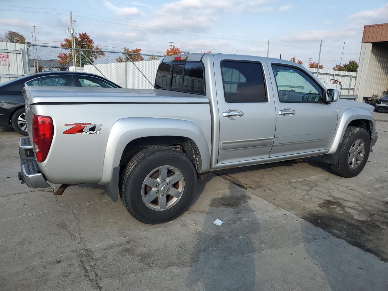 2011 Chevrolet Colorado VIN 1GCHTDFE9B8131694 Copart auction photo, front end / side damage thumbnail 3