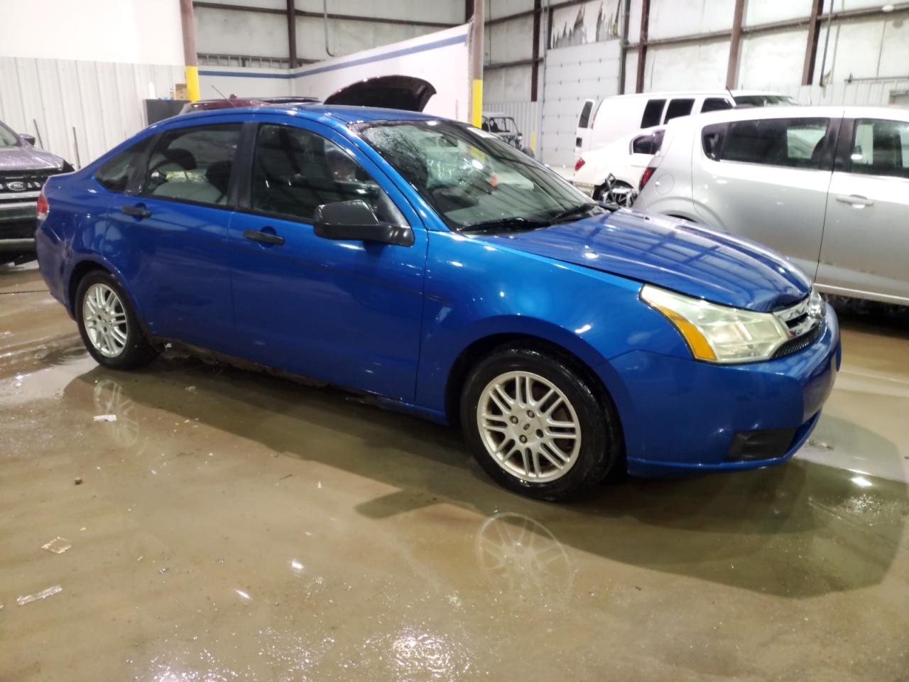 2010 Ford Focus VIN 1FAHP3FN6AW215163 Copart auction photo, water/flood damage thumbnail 4