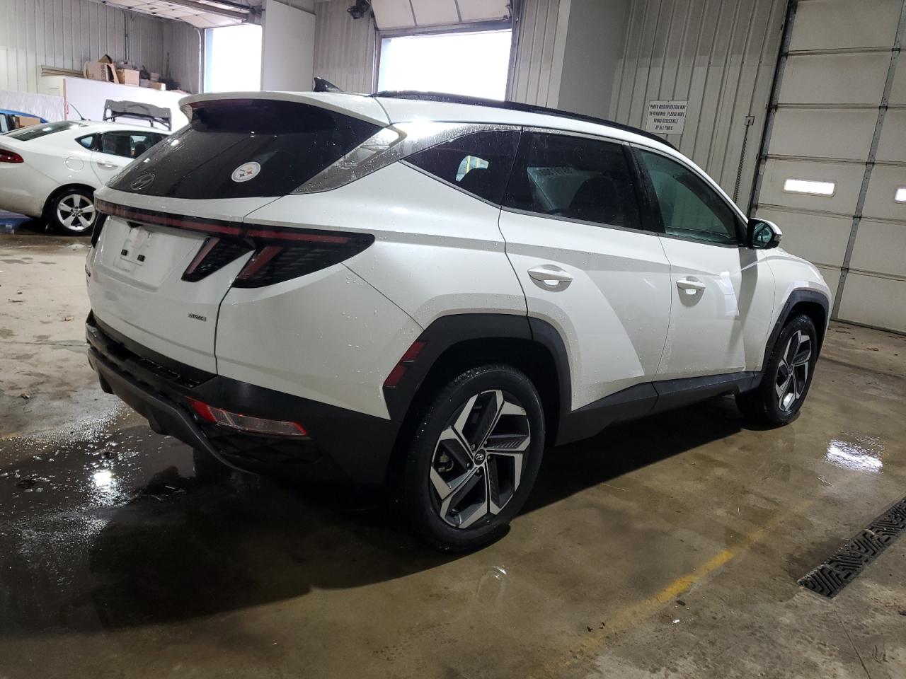 2022 Hyundai Tucson VIN 5NMJECAE3NH023636 Copart auction photo, side / front end damage thumbnail 3