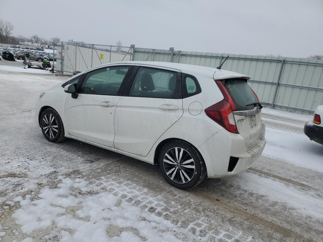 2015 Honda Fit VIN 3HGGK5H8XFM739626 Copart auction photo, side / front end damage thumbnail 2