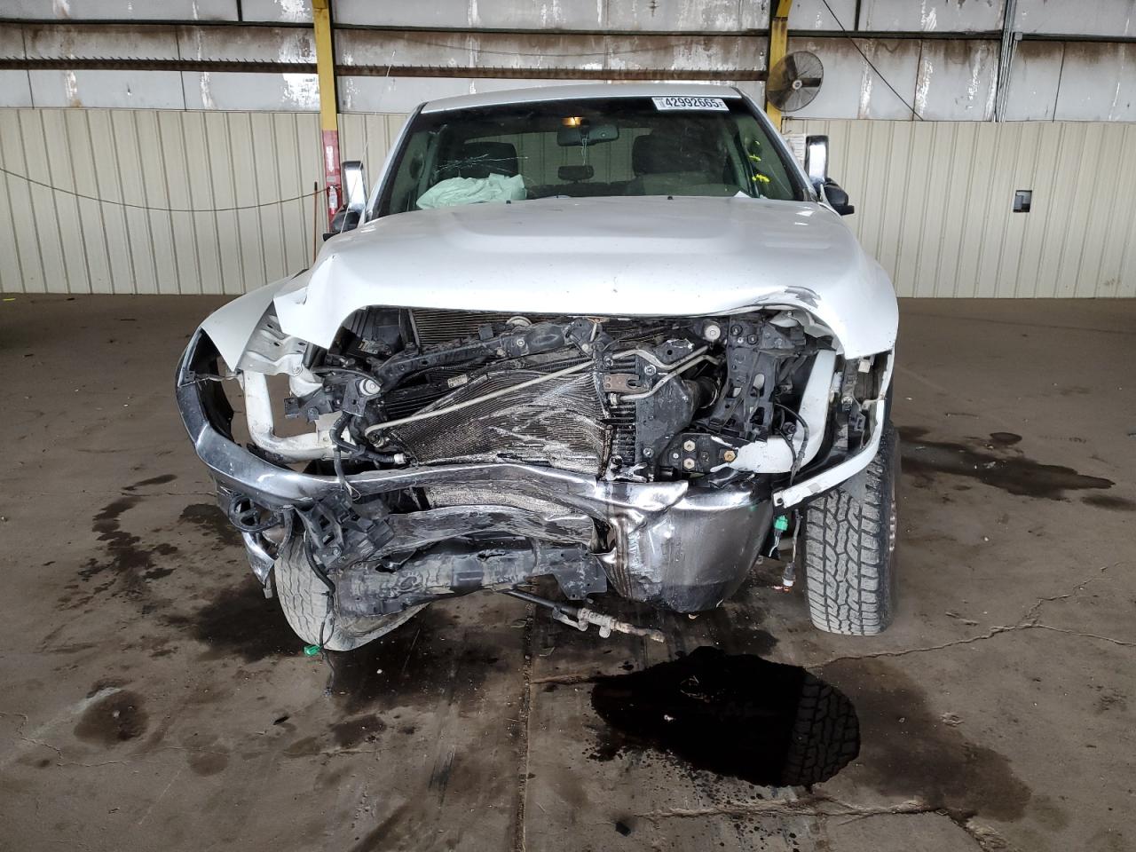 2012 Dodge RAM VIN 3C6UD5DL9CG243367 Copart auction photo, front end damage thumbnail 5