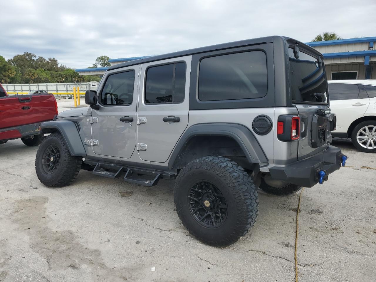 2018 Jeep Wrangler VIN 1C4HJXDG4JW167721 Copart auction photo, front end / undercarriage damage thumbnail 2