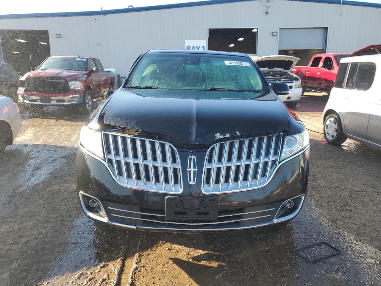 2011 Lincoln MKT VIN 2LMHJ5ATXBBJ53461 Copart auction photo, side / front end damage thumbnail 5