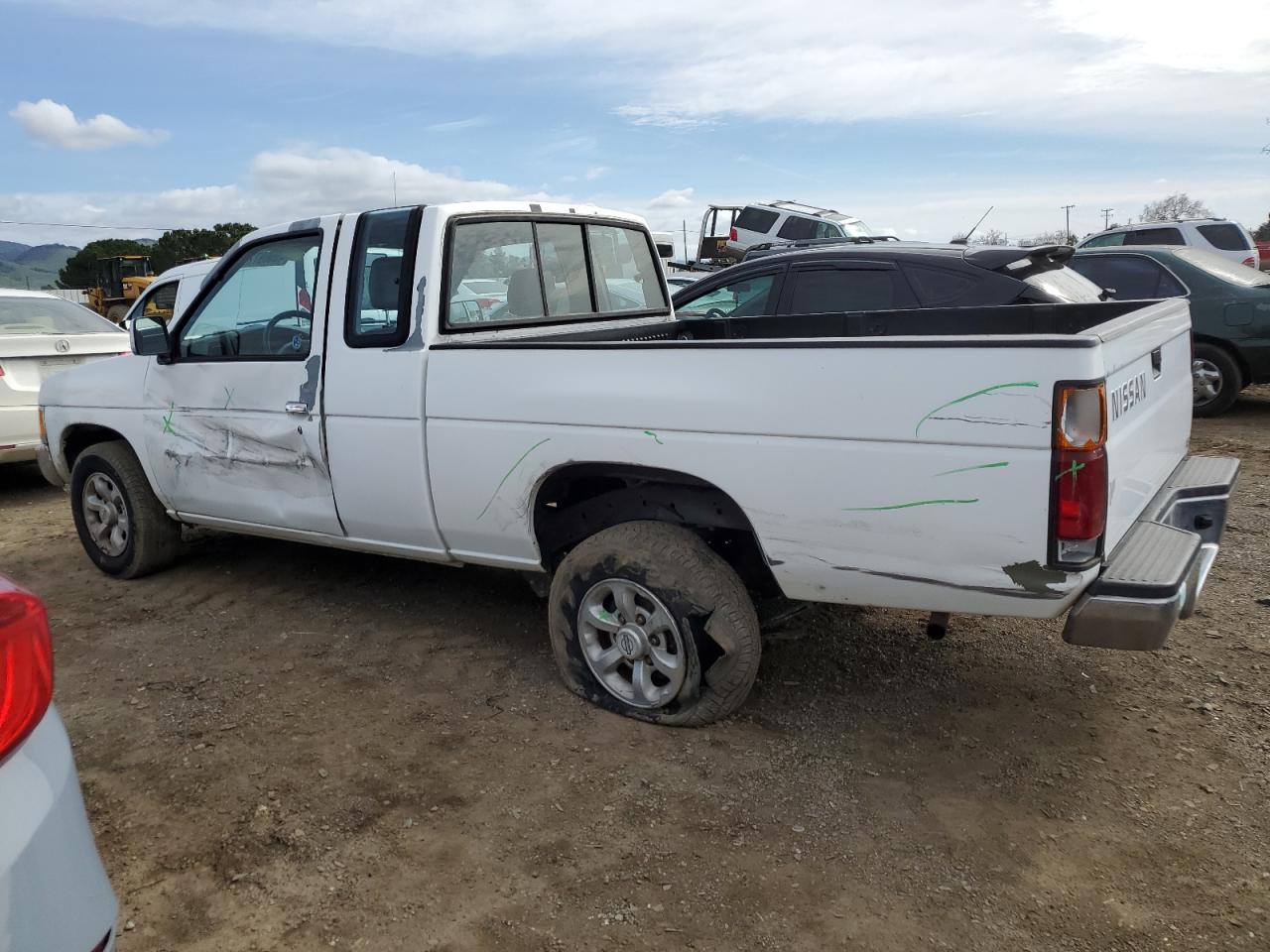 1997 Nissan Titan VIN 1N6SD16S4VC380295 Copart auction photo, side / rear end damage thumbnail 2