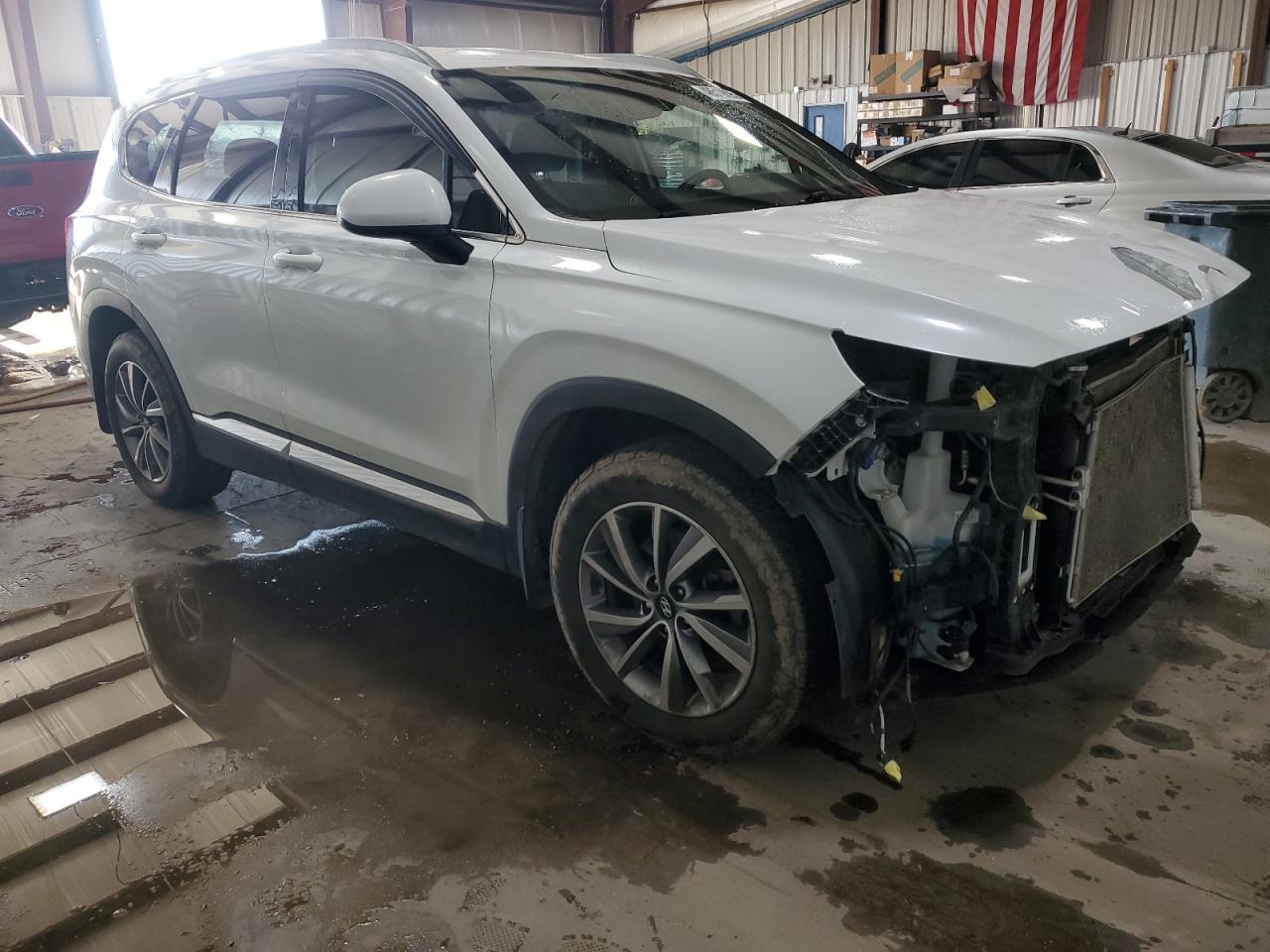 2019 Hyundai Santa Fe VIN 5NMS3CAD2KH115933 Copart auction photo, front end damage thumbnail 4