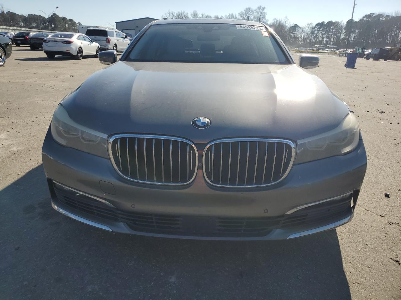 2016 BMW 7er VIN WBA7E2C51GG504431 Copart auction photo, undercarriage damage thumbnail 5
