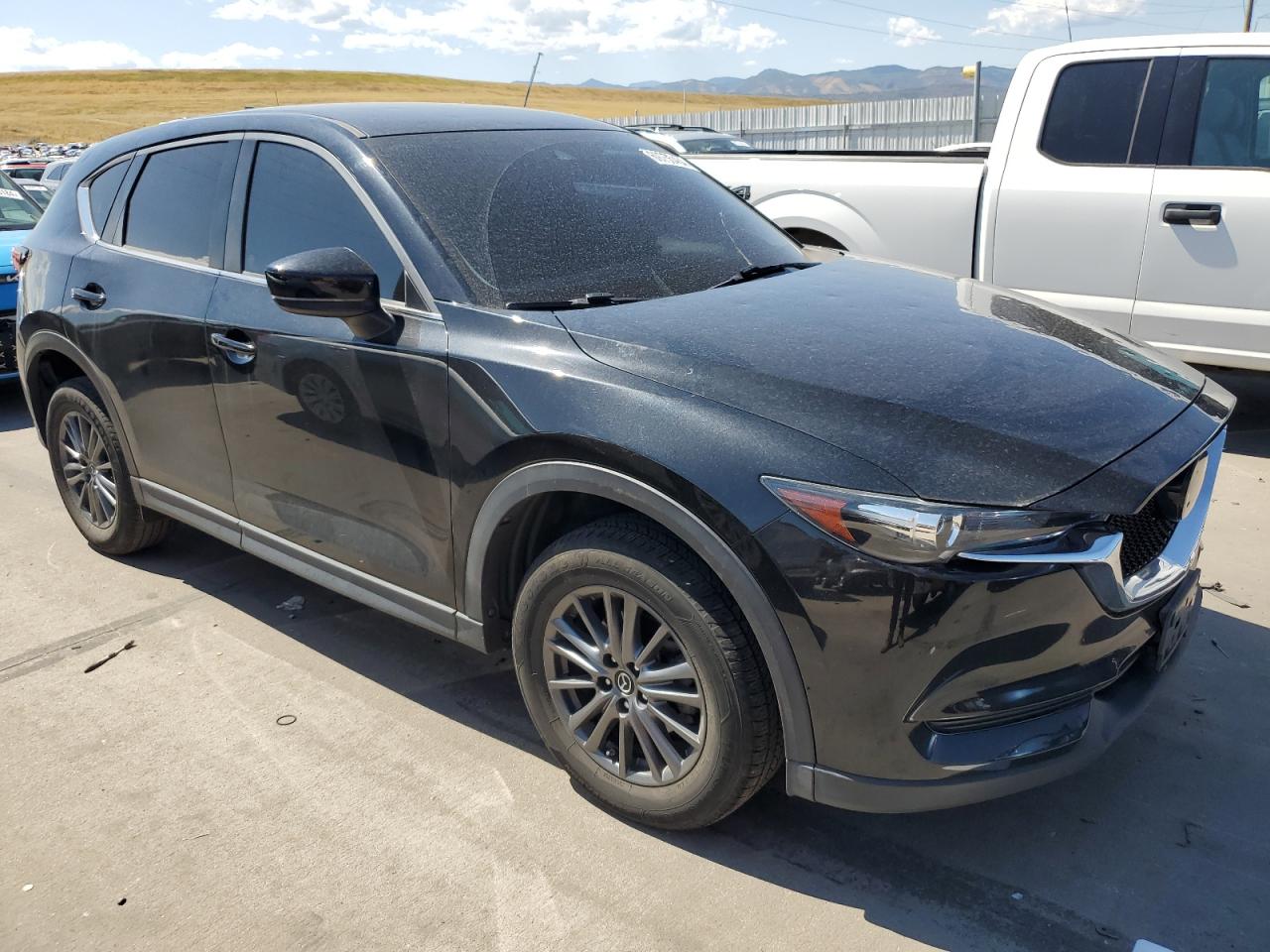 2019 Mazda CX-5 VIN JM3KFBCM7K0569732 Copart auction photo, hail / minor dent/scratches damage thumbnail 4