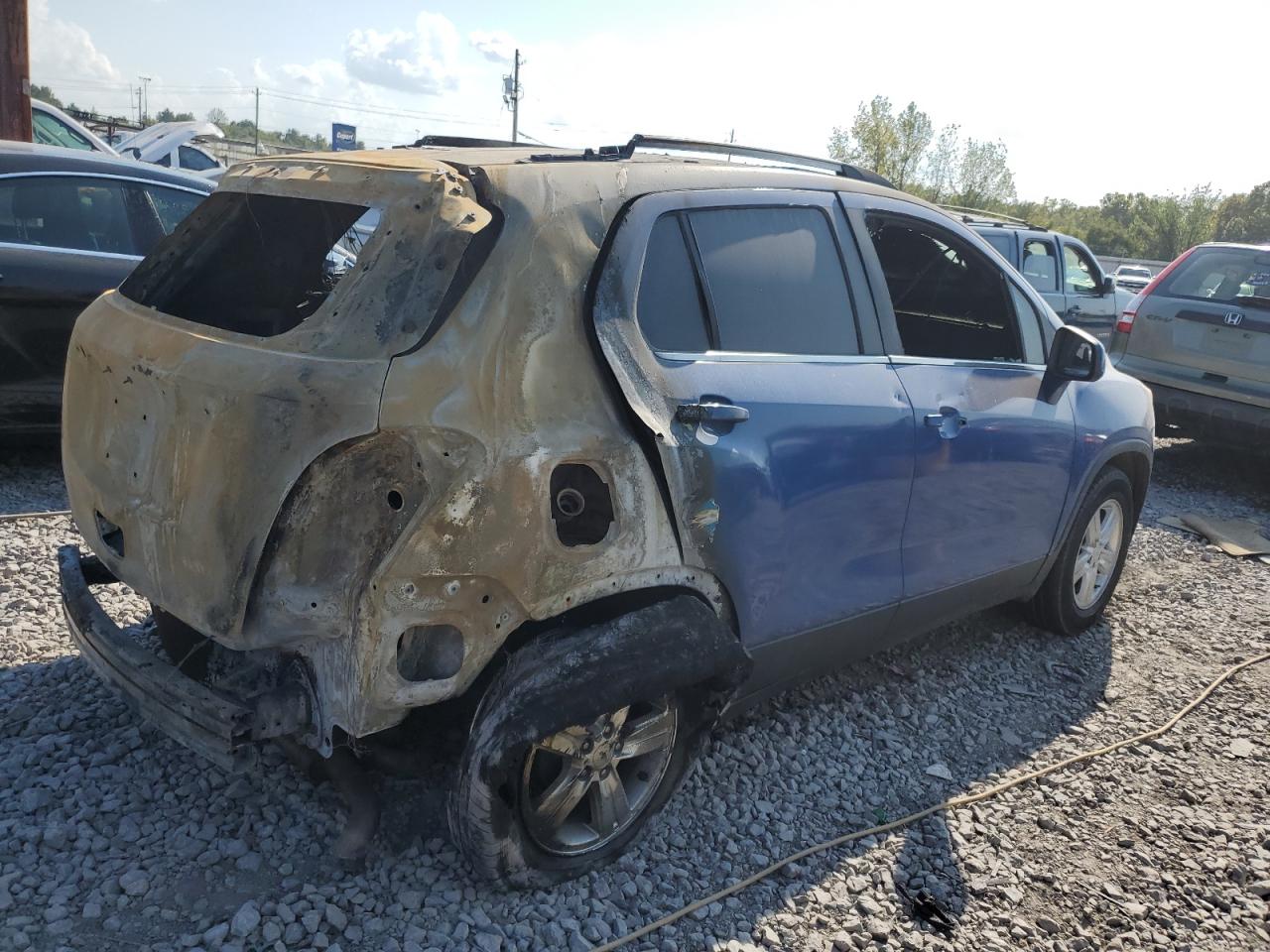 2015 Chevrolet Trax VIN KL7CJLSBXFB210870 Copart auction photo, burn damage thumbnail 3