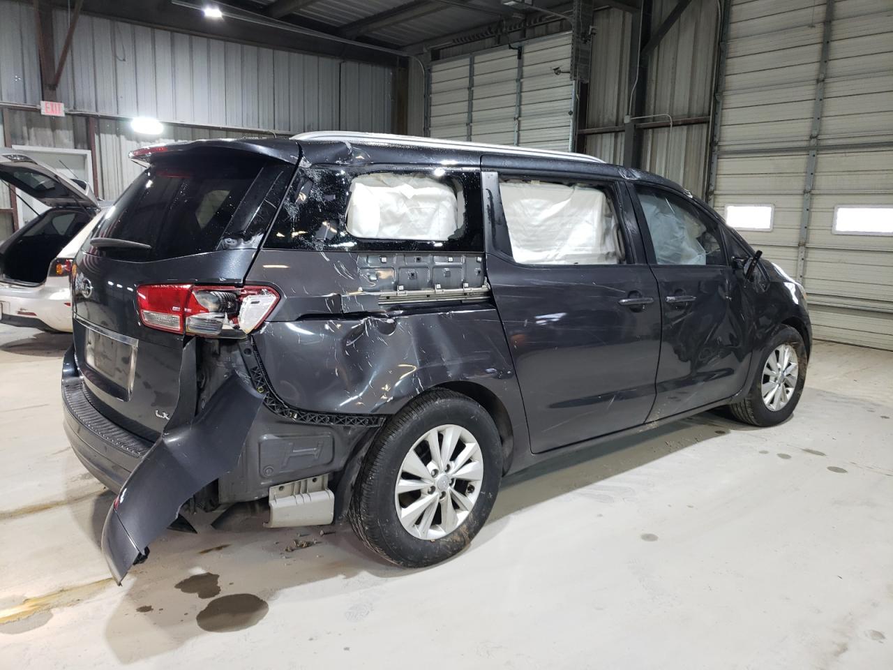 2016 KIA Sedona VIN KNDMB5C16G6166737 Copart auction photo, rollover damage thumbnail 3