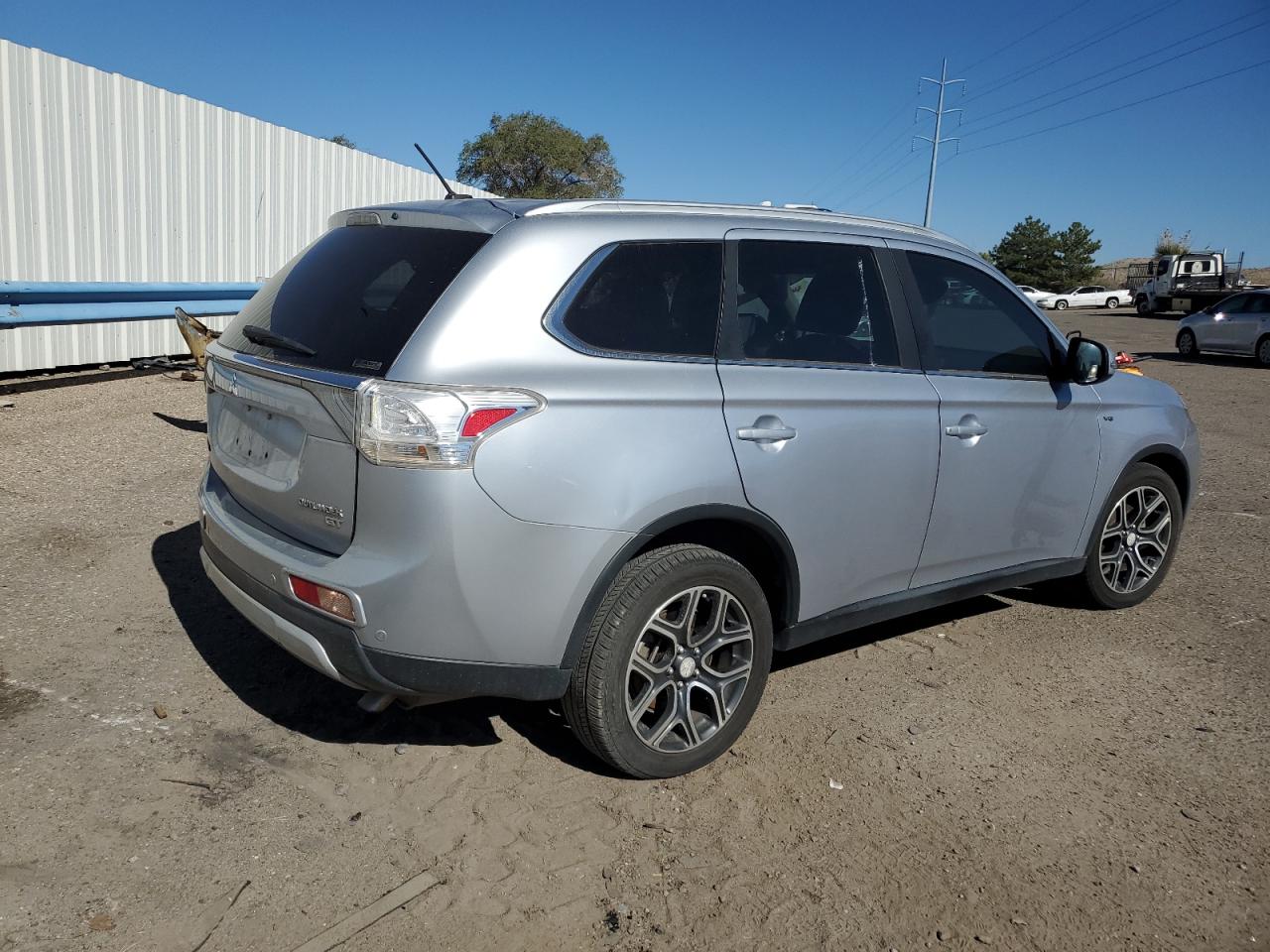 2015 Mitsubishi Outlander VIN JA4JZ4AX5FZ005710 Copart auction photo, side / undercarriage damage thumbnail 3
