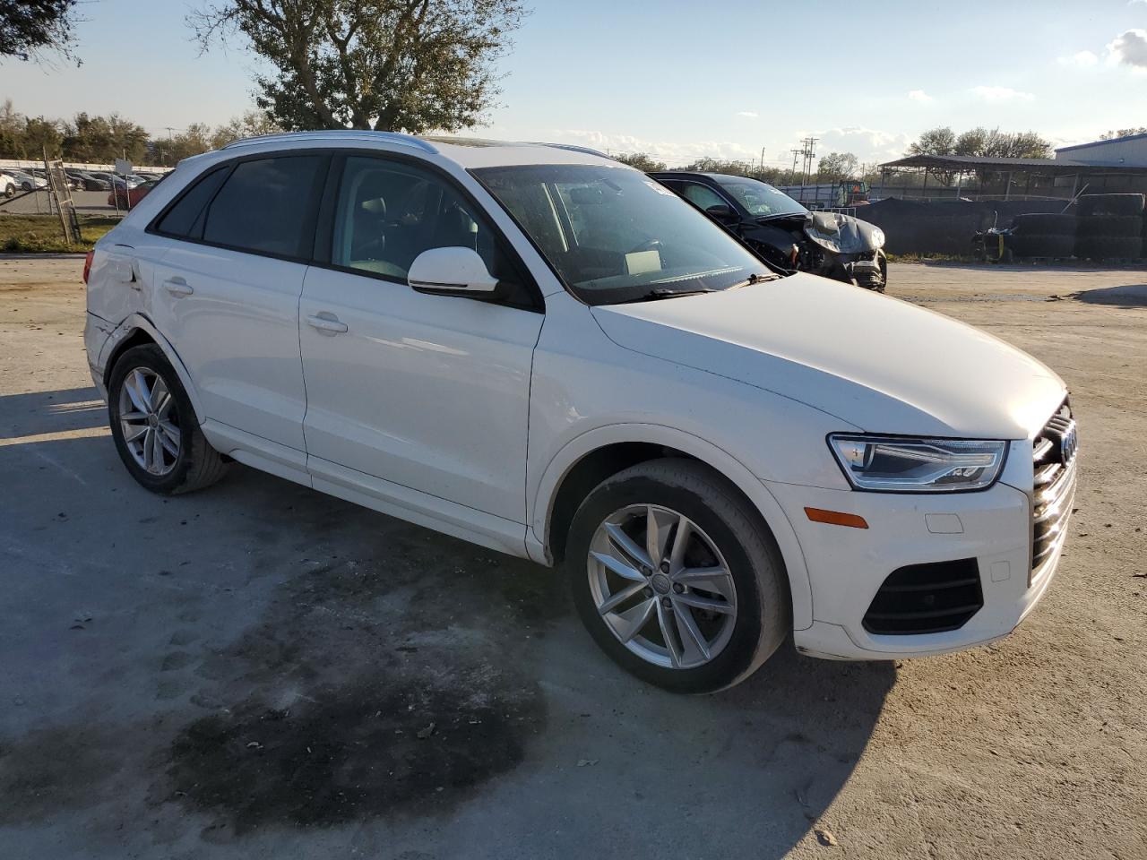2017 Audi Q3 VIN WA1BCCFS9HR015169 Copart auction photo, rear end damage thumbnail 4