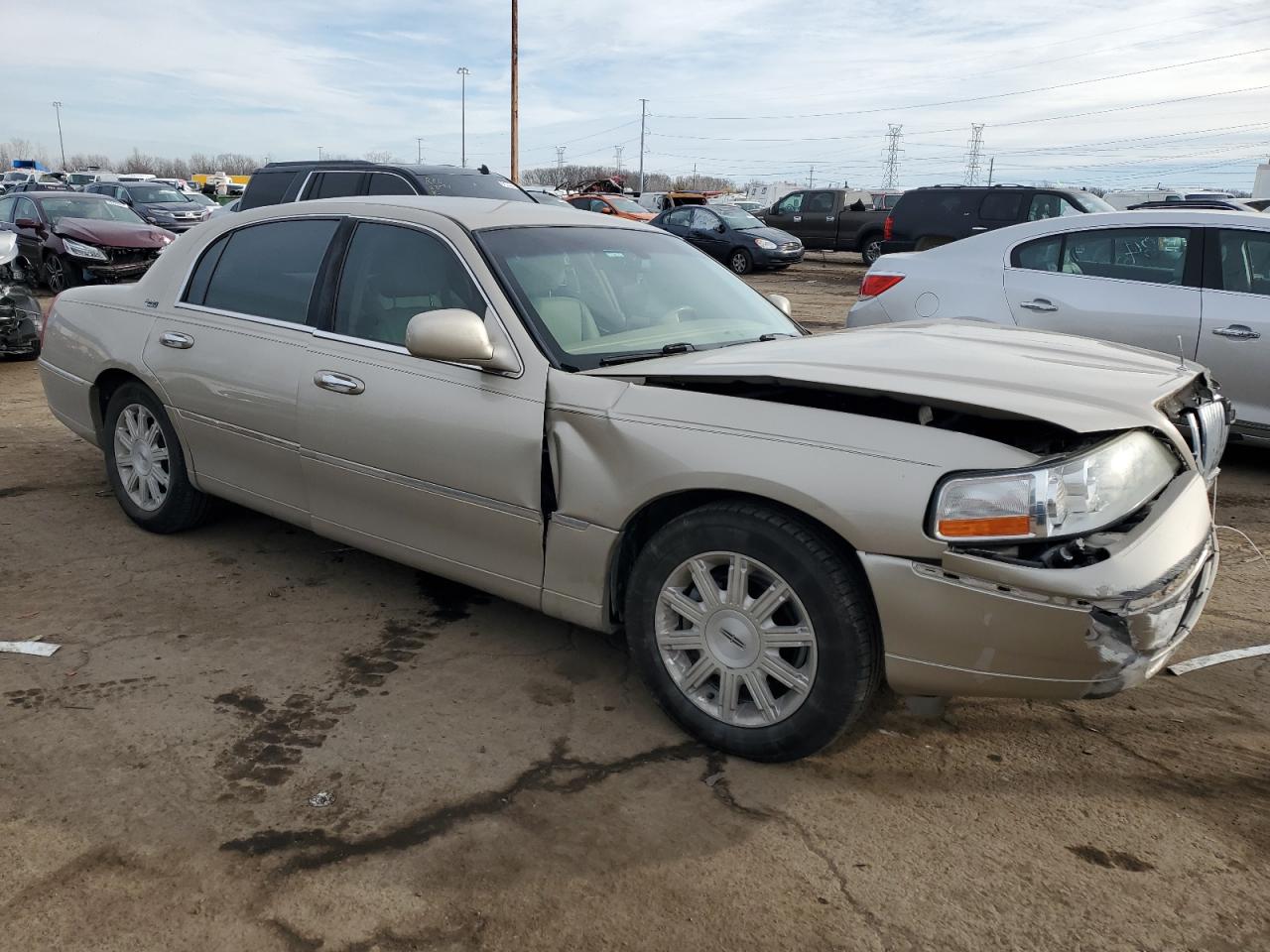 2010 Lincoln Town Car VIN 2LNBL8CV4AX622220 Copart auction photo, front end / side damage thumbnail 4