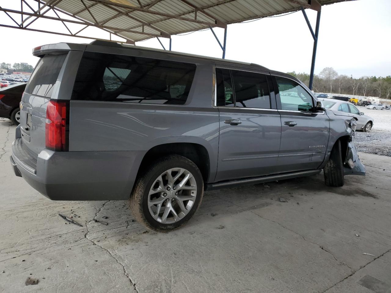 2018 Chevrolet Suburban VIN 1GNSCJKC1JR203318 Copart auction photo, front end / side damage thumbnail 3