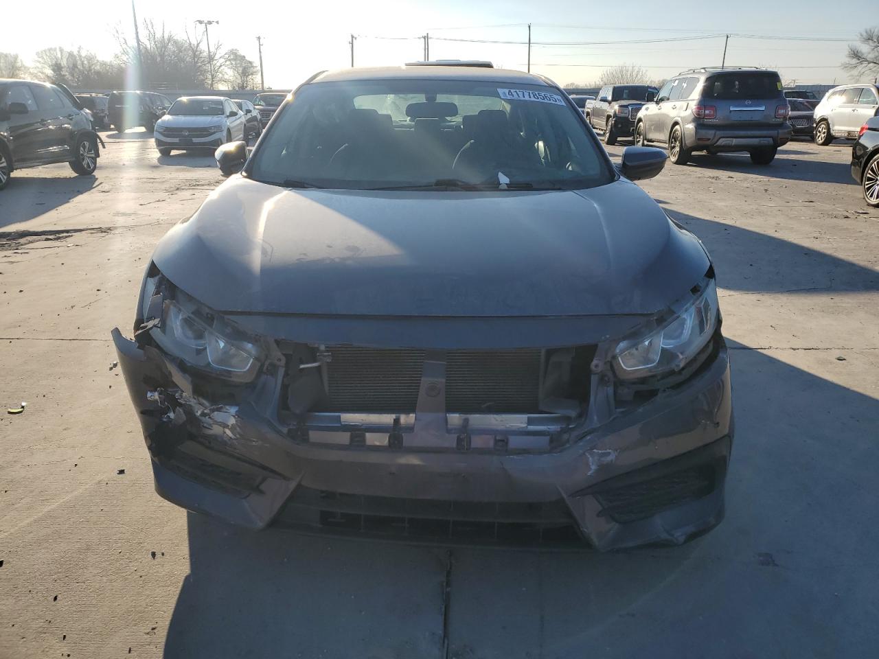 2018 Honda Civic VIN 19XFC2F5XJE023424 Copart auction photo, front end / hail damage thumbnail 5