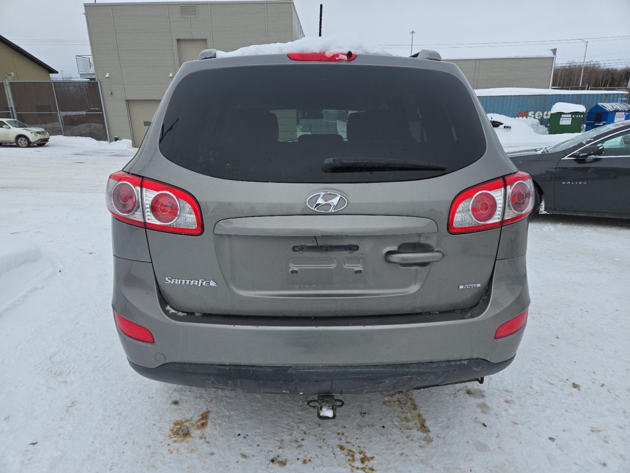 2012 Hyundai Santa Fe VIN 5XYZGDAG7CG141636 Copart auction photo, front end / side damage thumbnail 6