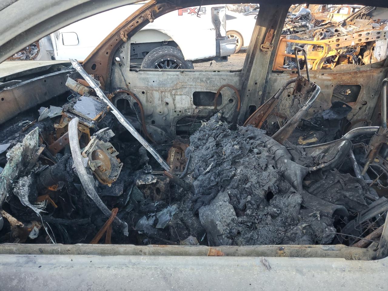 2021 Toyota Tacoma VIN 5TFCZ5AN2MX252243 Copart auction photo, burn damage thumbnail 7