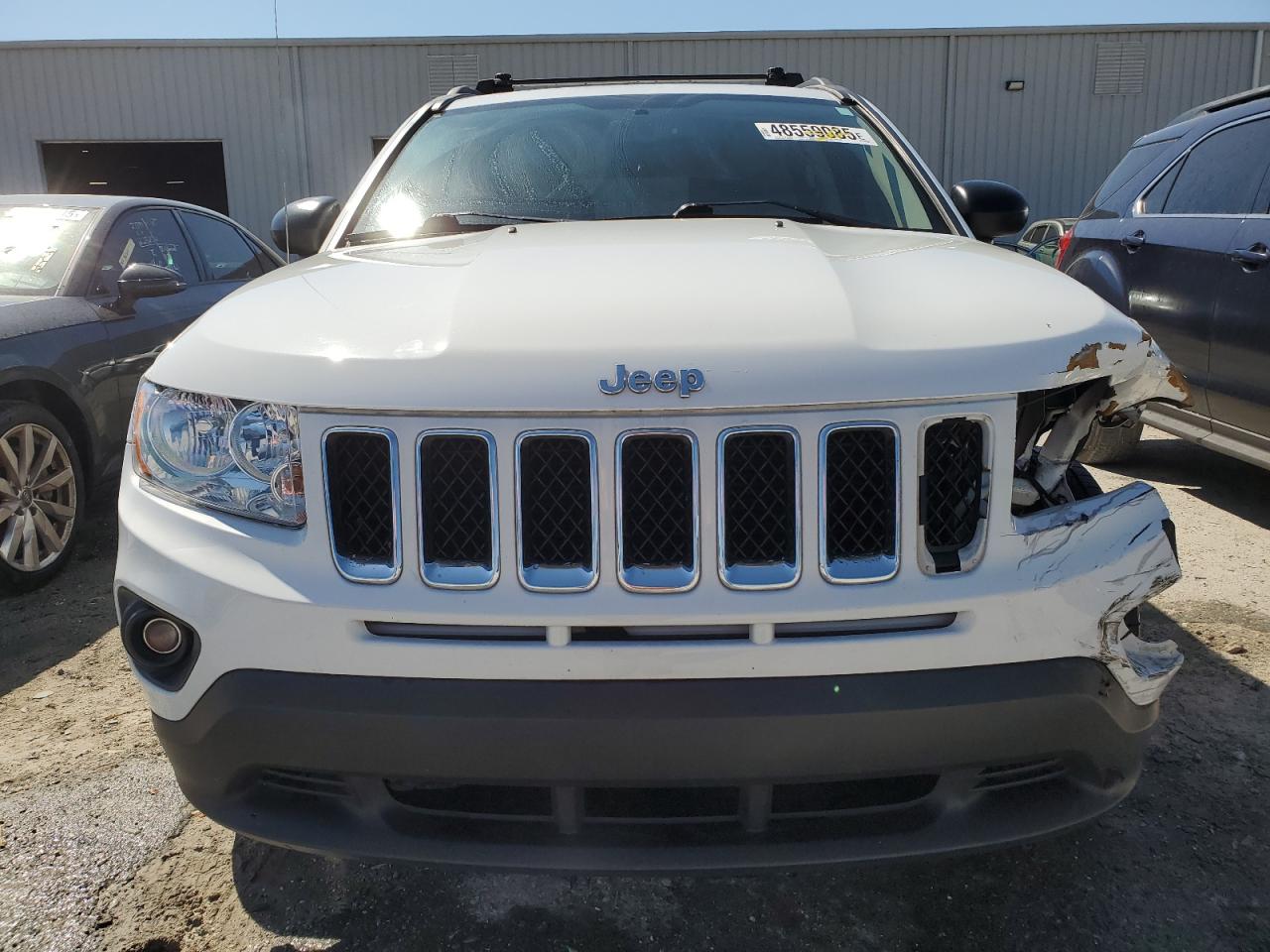 2012 Jeep Compass VIN 1C4NJCBA4CD605775 Copart auction photo, front end / minor dent/scratches damage thumbnail 5