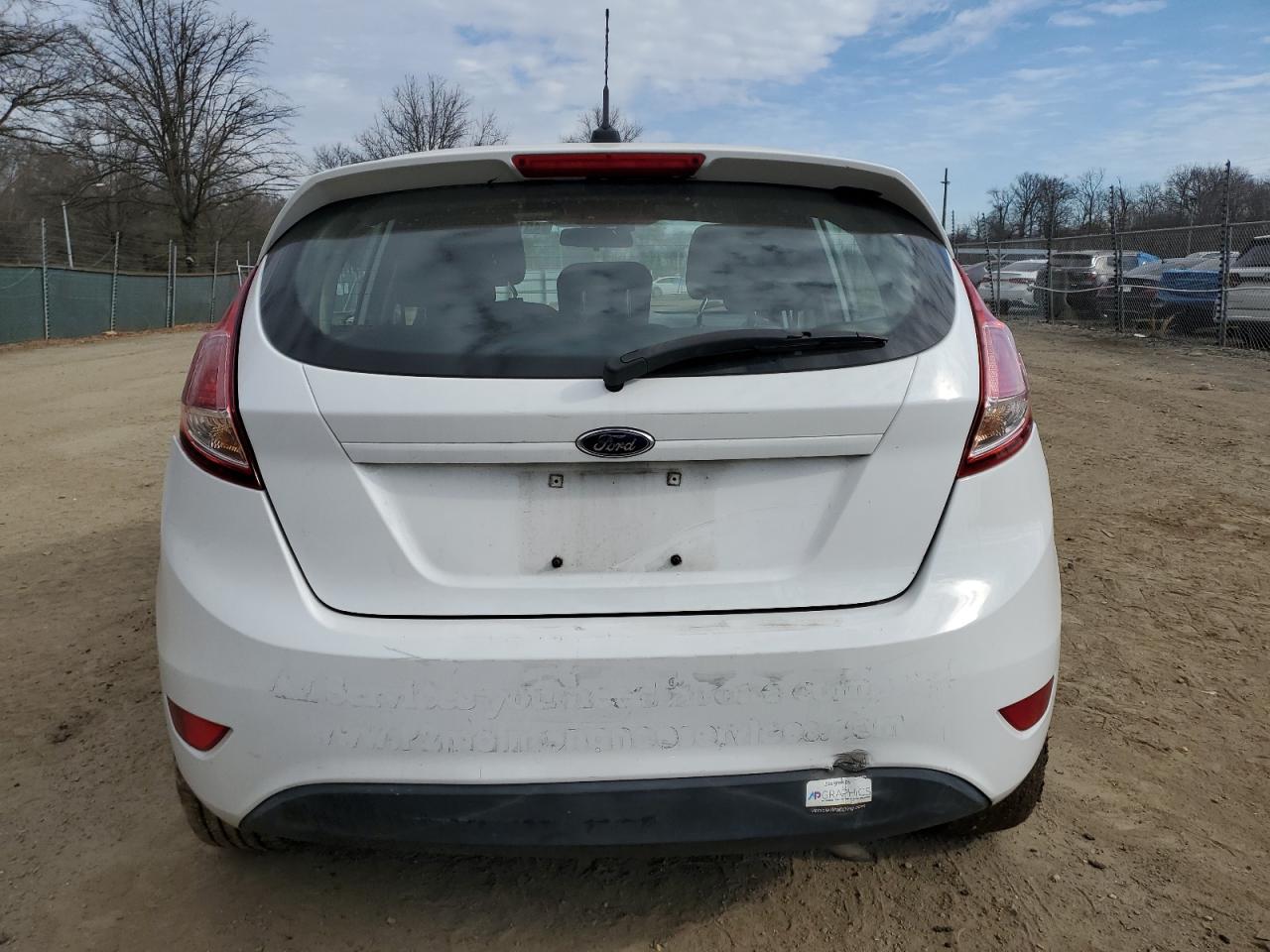 2017 Ford Fiesta VIN 3FADP4TJ9HM121780 Copart auction photo, front end / rear end damage thumbnail 6