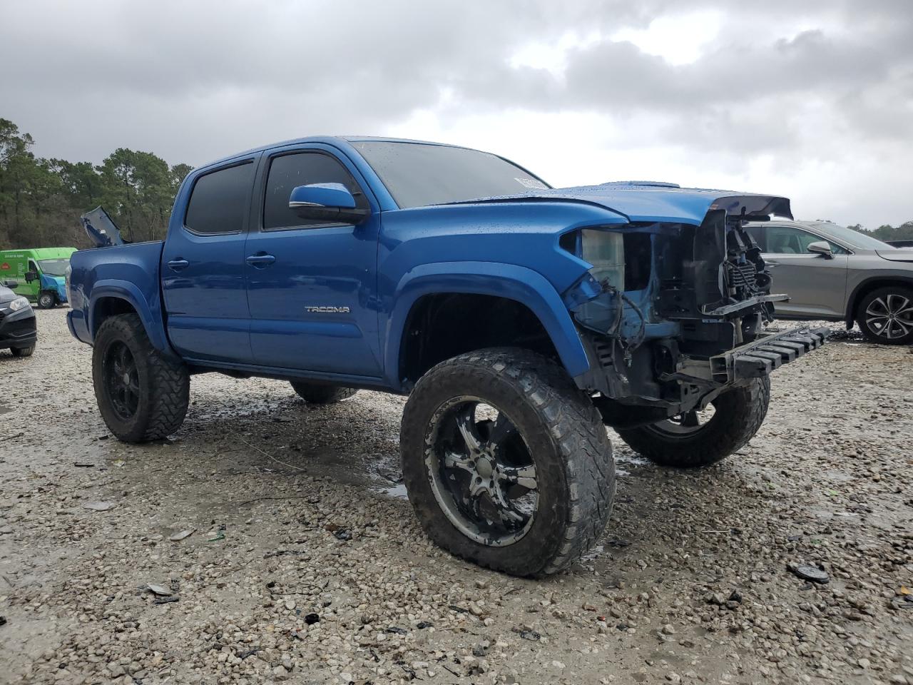 2017 Toyota Tacoma VIN 5TFAZ5CN7HX027326 Copart auction photo, front end / rear end damage thumbnail 4