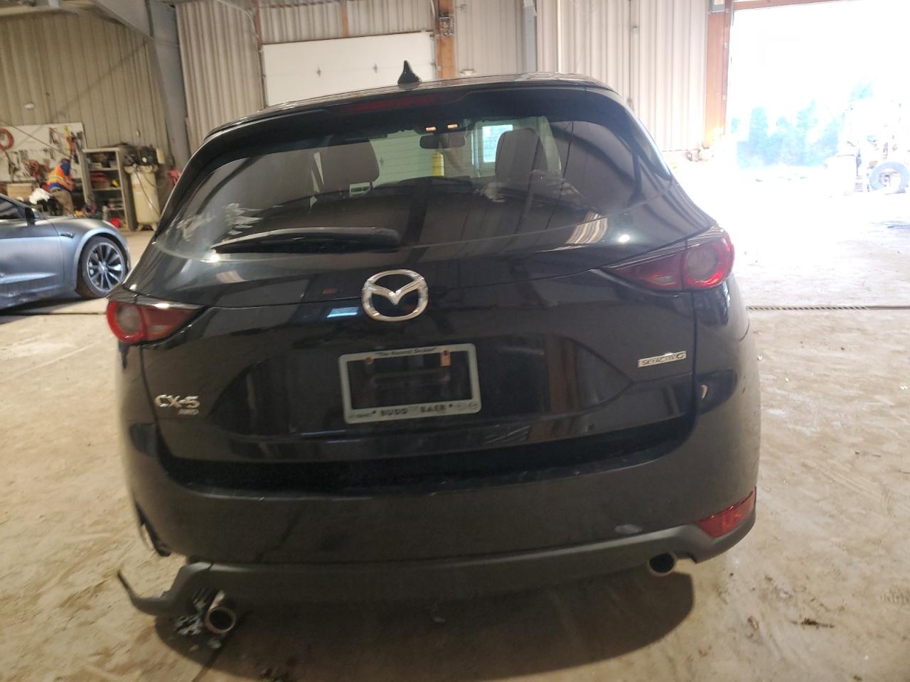 2020 Mazda CX-5 VIN JM3KFBCM5L0777531 Copart auction photo, side / rear end damage thumbnail 6