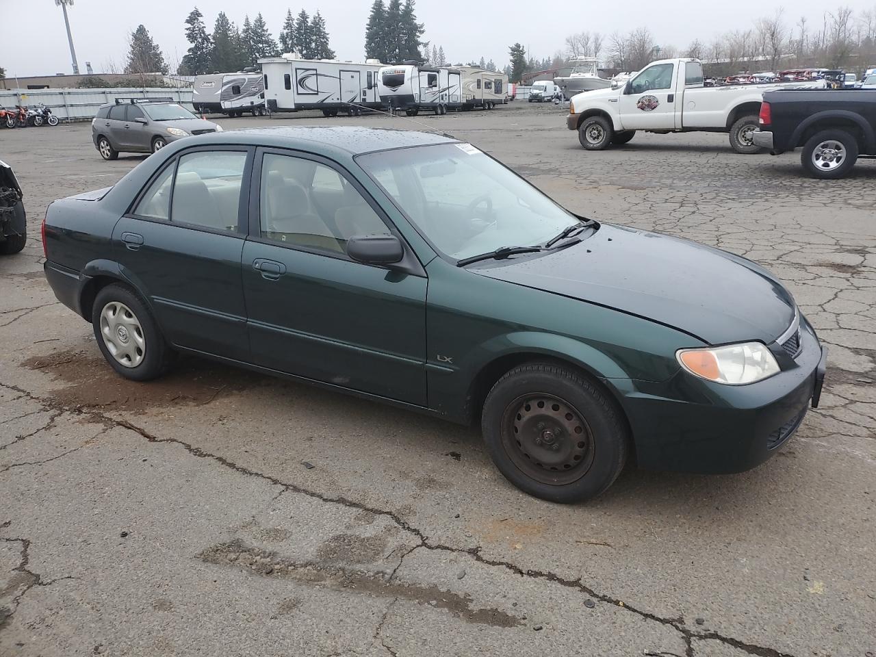 2001 Mazda Protege VIN JM1BJ222910404111 Copart auction photo, all over damage thumbnail 4