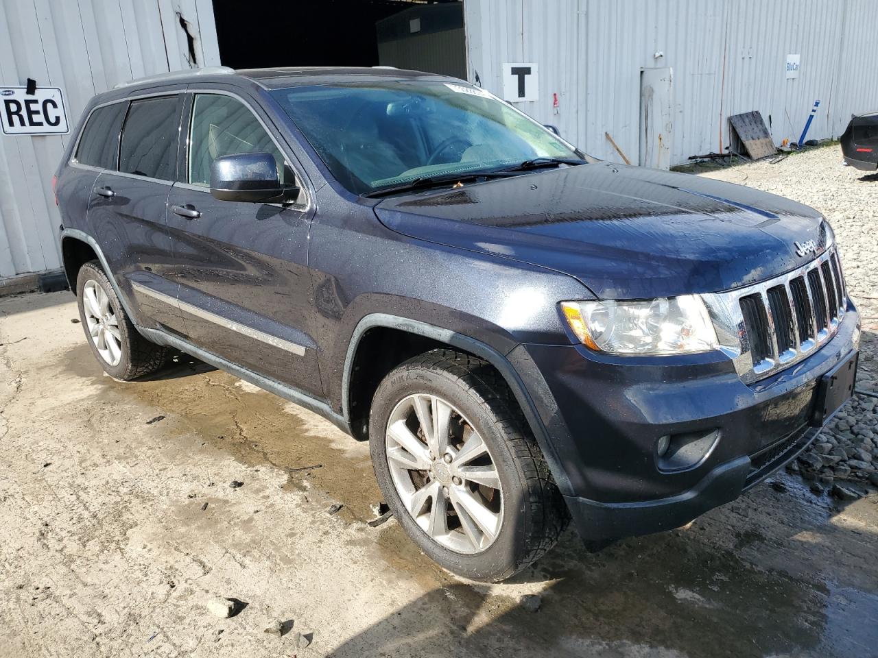2013 Jeep Grand Cherokee VIN 1C4RJFAG2DC594601 Copart auction photo, side / rear end damage thumbnail 4