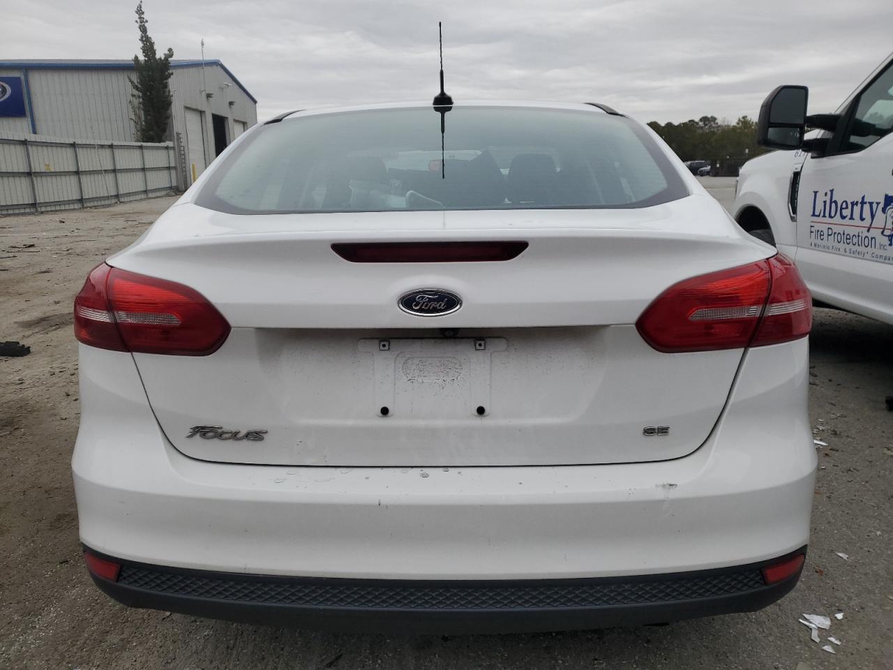 2018 Ford Focus VIN 1FADP3F27JL327587 Copart auction photo, front end damage thumbnail 6