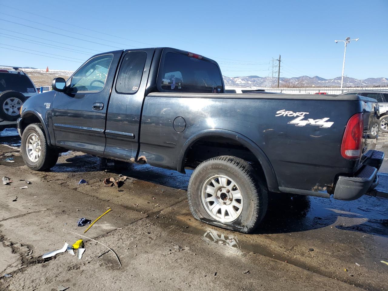 2003 Ford F-150 VIN 1FTRX18L43NB91758 Copart auction photo, rollover damage thumbnail 2