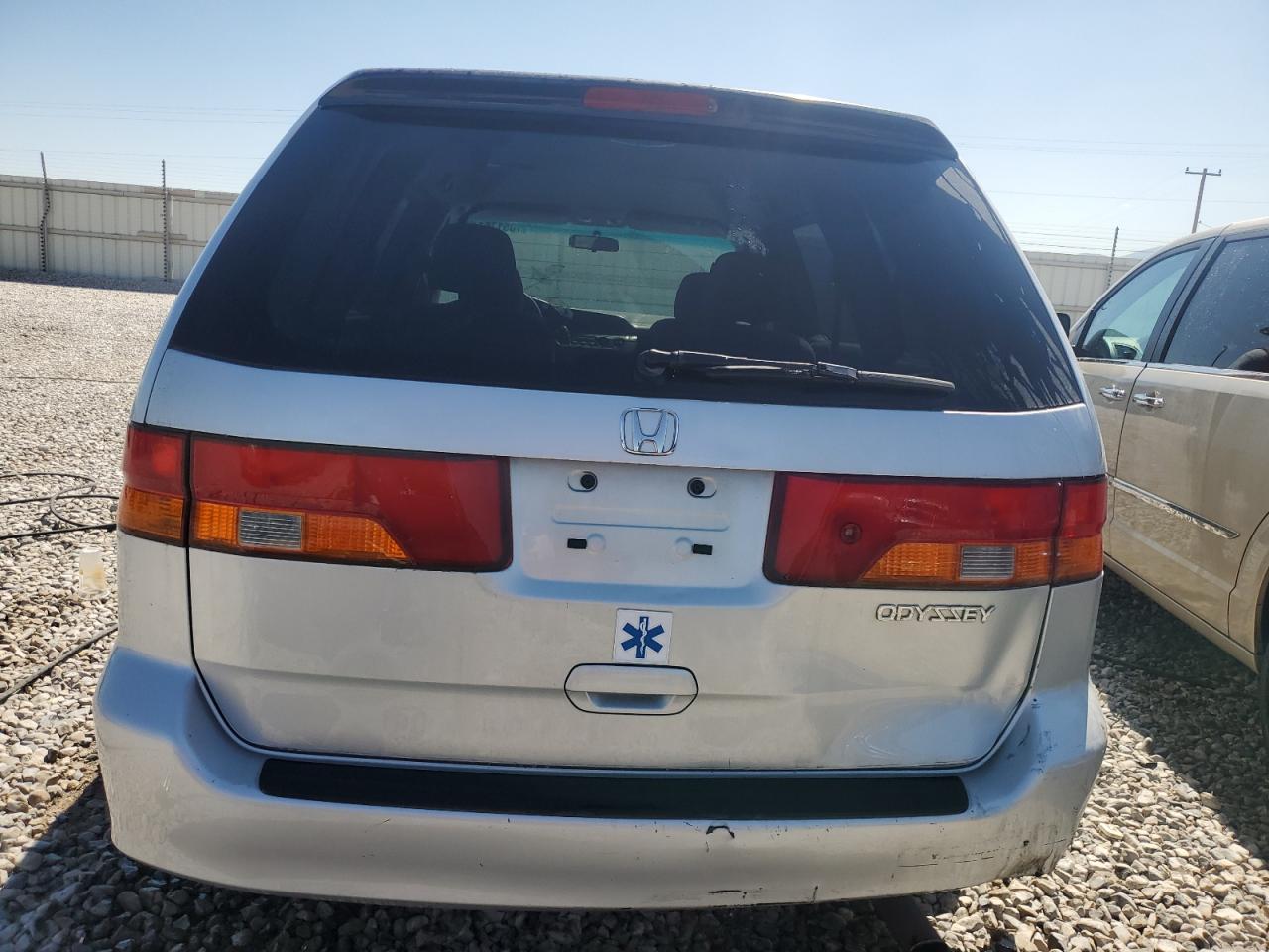 2002 Honda Odyssey VIN 2HKRL18512H528835 Copart auction photo, rear end damage thumbnail 6