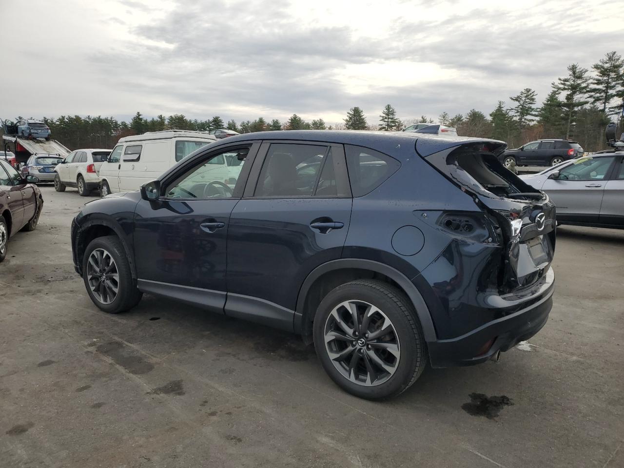 2016 Mazda CX-5 VIN JM3KE4DY2G0787763 Copart auction photo, rear end / all over damage thumbnail 2
