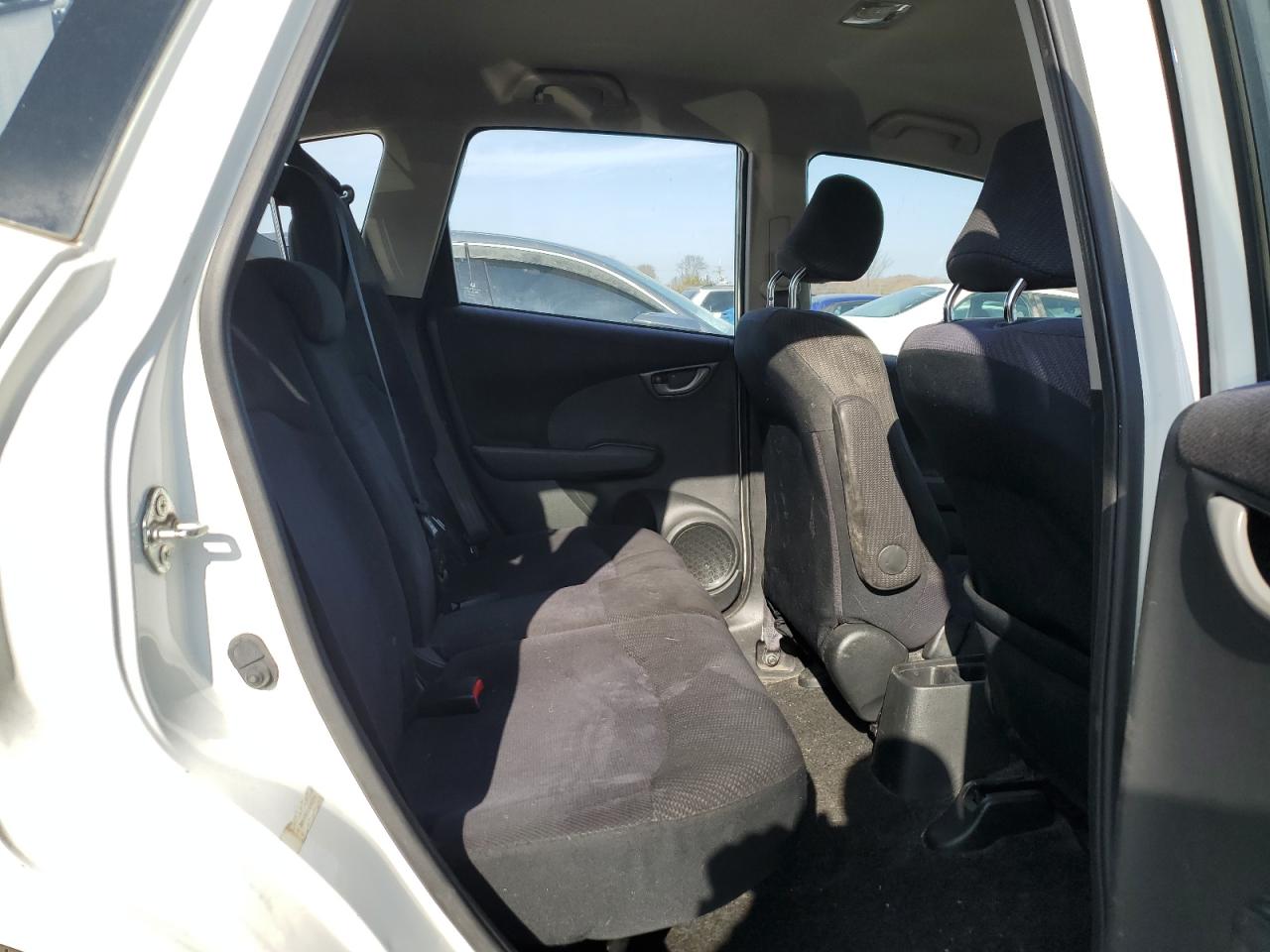 2012 Honda Fit VIN JHMGE8H51CC001593 Copart auction photo, all over damage thumbnail 11