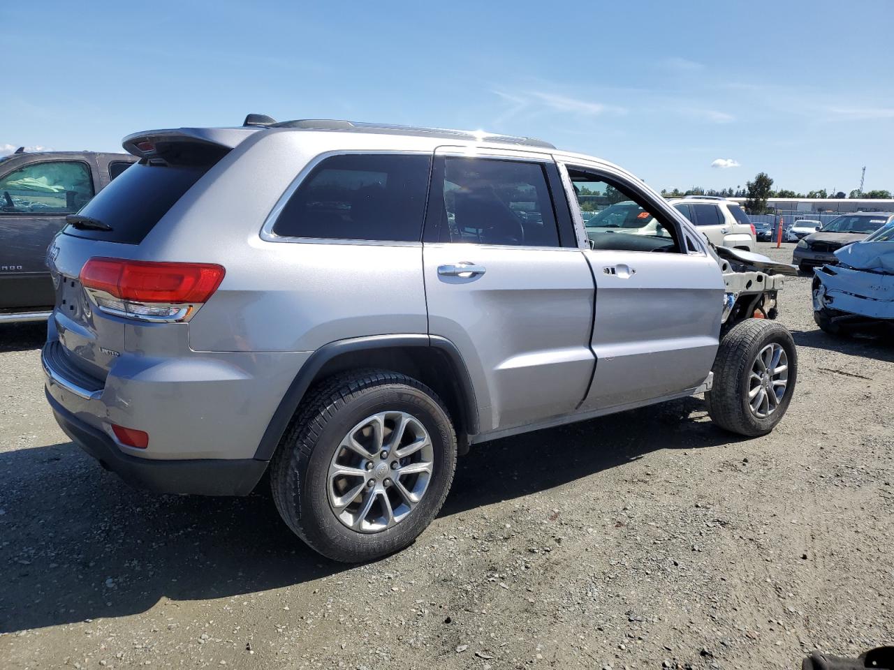 2015 Jeep Grand Cherokee VIN 1C4RJFBG3FC775658 Copart auction photo, front end / side damage thumbnail 3