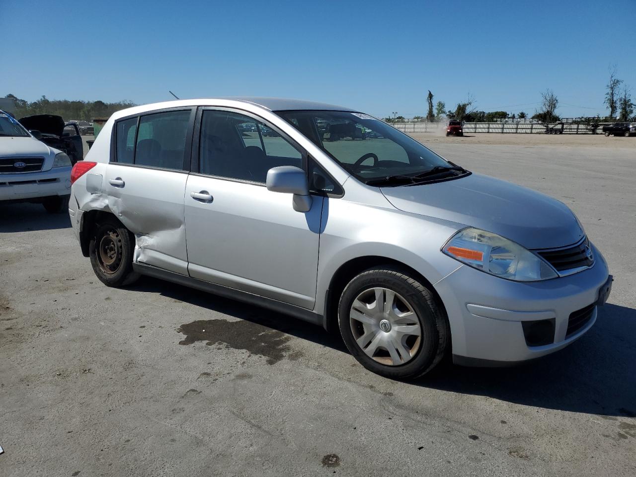 2010 Nissan Versa VIN 3N1BC1CP4AL448330 Copart auction photo, side / rear end damage thumbnail 4