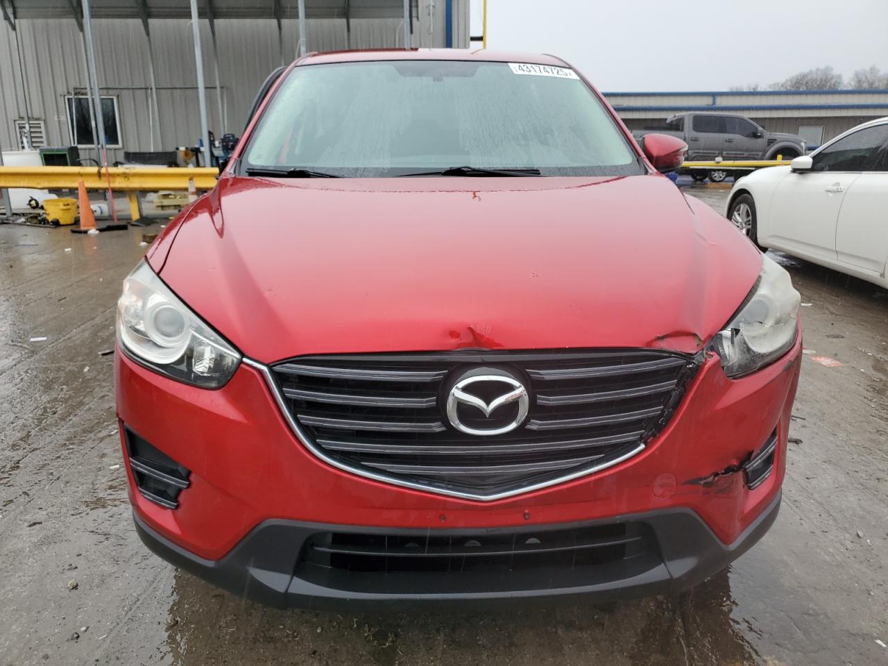2016 Mazda CX-5 VIN JM3KE2BY0G0822260 Copart auction photo, side damage thumbnail 5