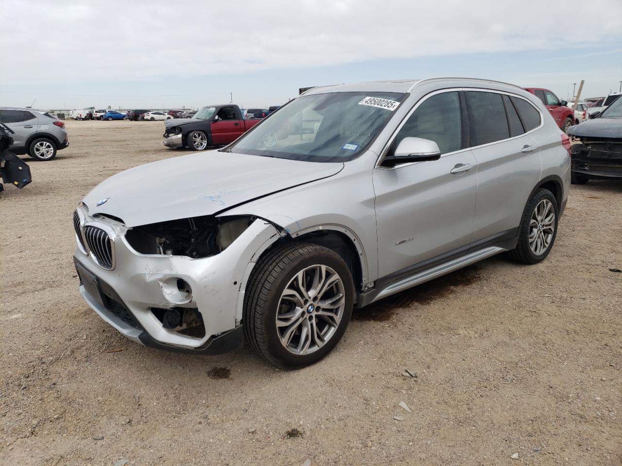 2017 BMW X1 VIN WBXHT3Z32H4A64916 - Copart auction photo