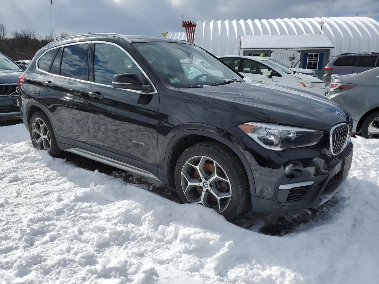 2018 BMW X1 VIN WBXHT3C32J5K23858 Copart auction photo, side / minor dent/scratches damage thumbnail 4