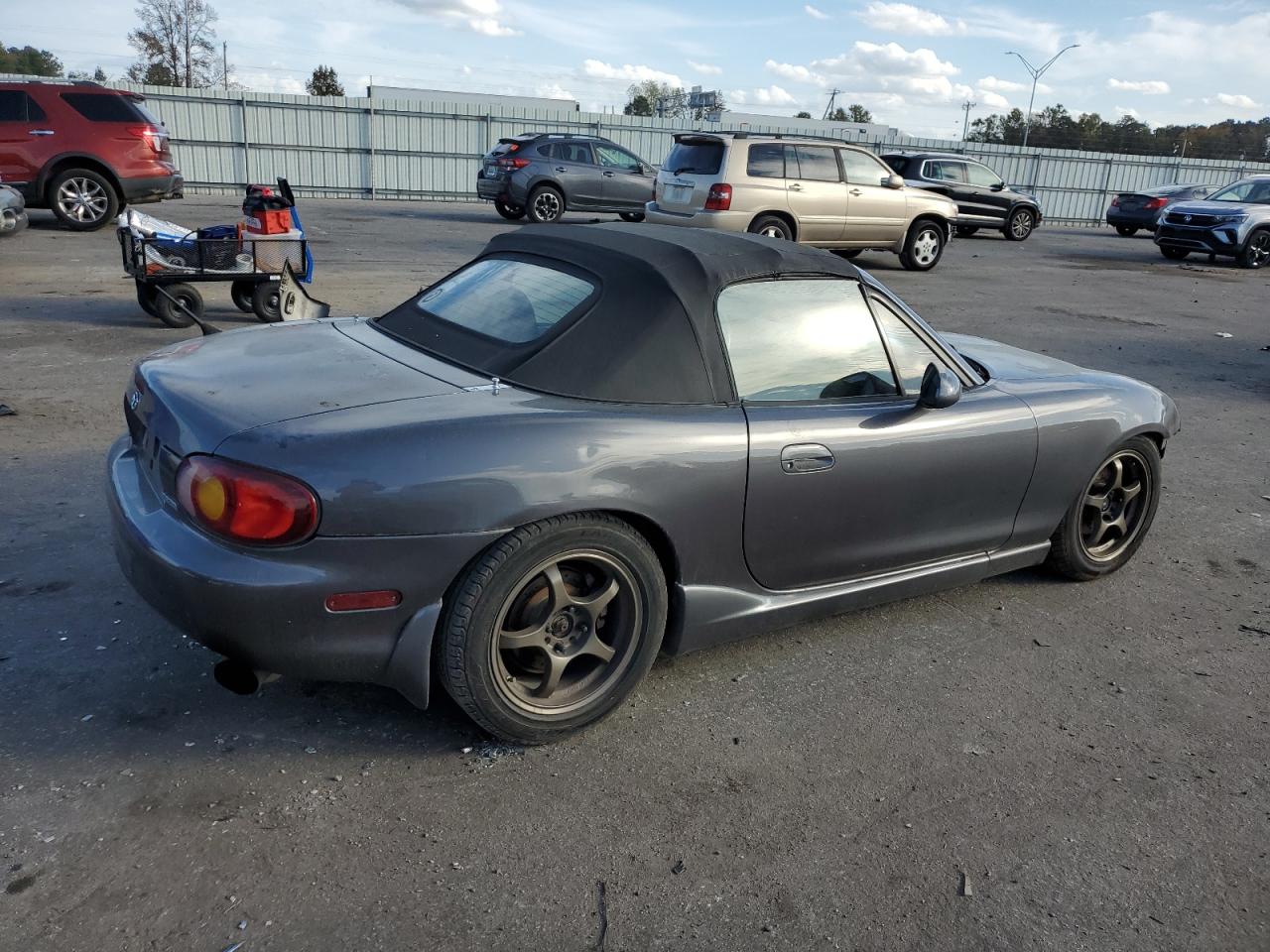 1999 Mazda MX-5 VIN JM1NB3535X0115739 Copart auction photo, front end / side damage thumbnail 3