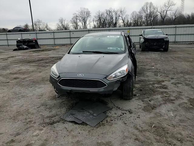 2015 Ford Focus VIN 1FADP3F20FL381434 Copart auction photo, all over / minor dent/scratches damage thumbnail 11