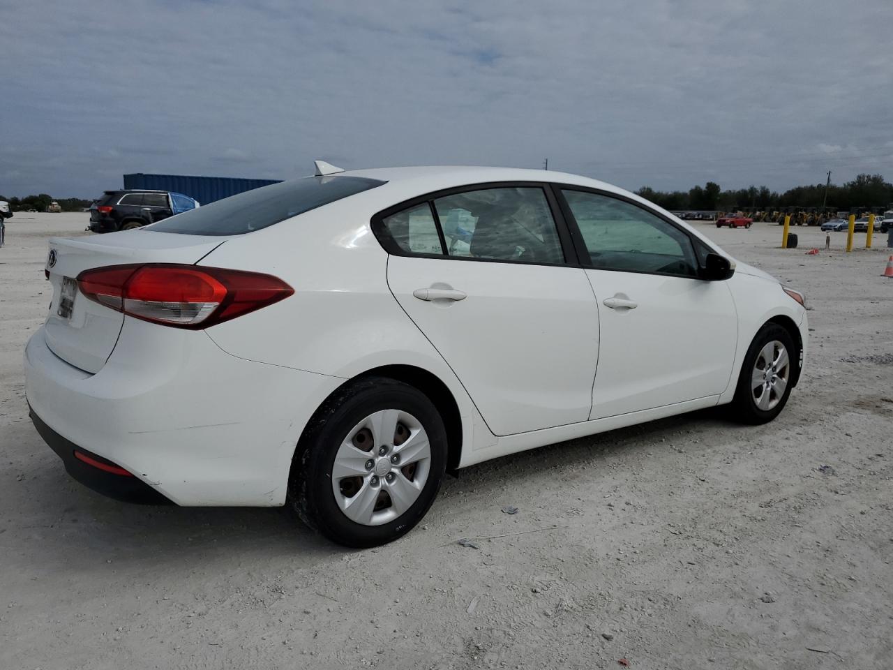 2017 KIA Forte VIN 3KPFK4A72HE093744 Copart auction photo, rear end / minor dent/scratches damage thumbnail 3