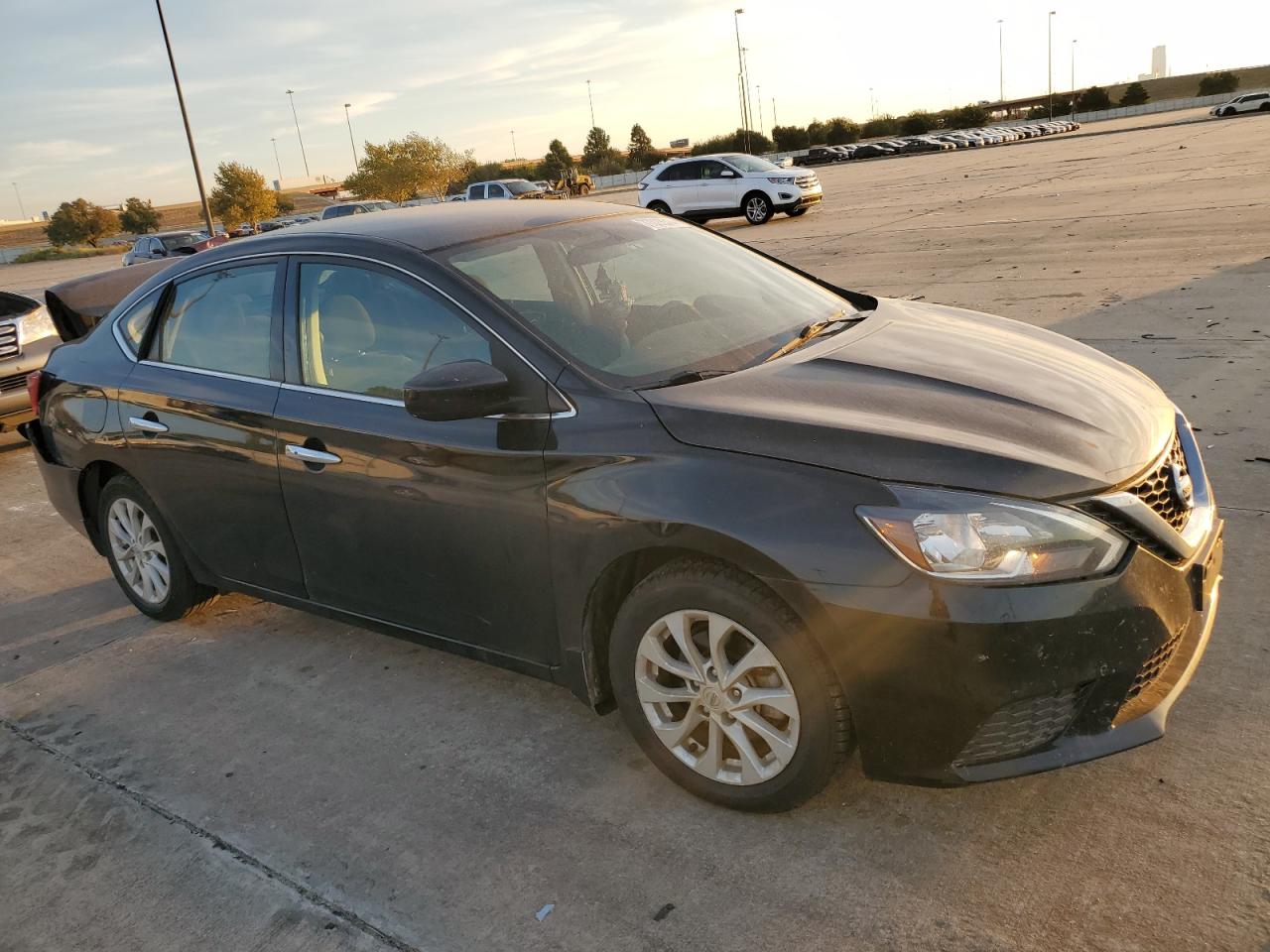 2019 Nissan Sentra VIN 3N1AB7AP6KL604440 Copart auction photo, rear end / minor dent/scratches damage thumbnail 4