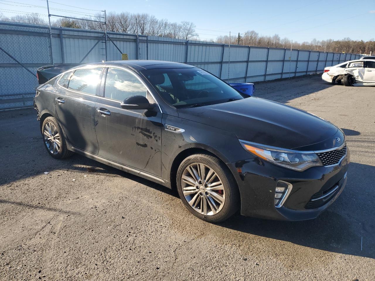 2018 KIA Optima VIN 5XXGV4L2XJG241259 Copart auction photo, rear end damage thumbnail 4