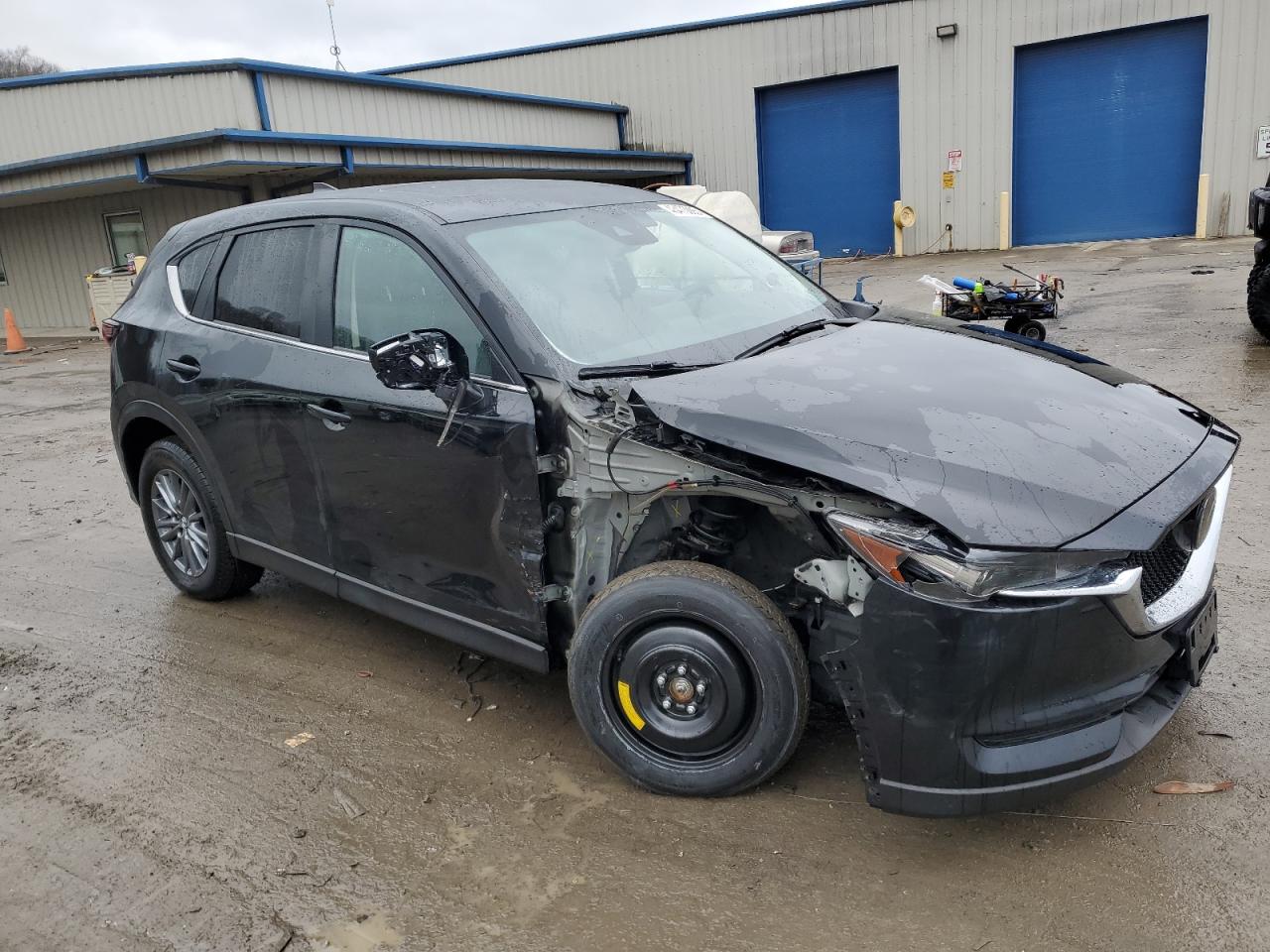2021 Mazda CX-5 VIN JM3KFBCMXM0436997 Copart auction photo, front end / side damage thumbnail 4