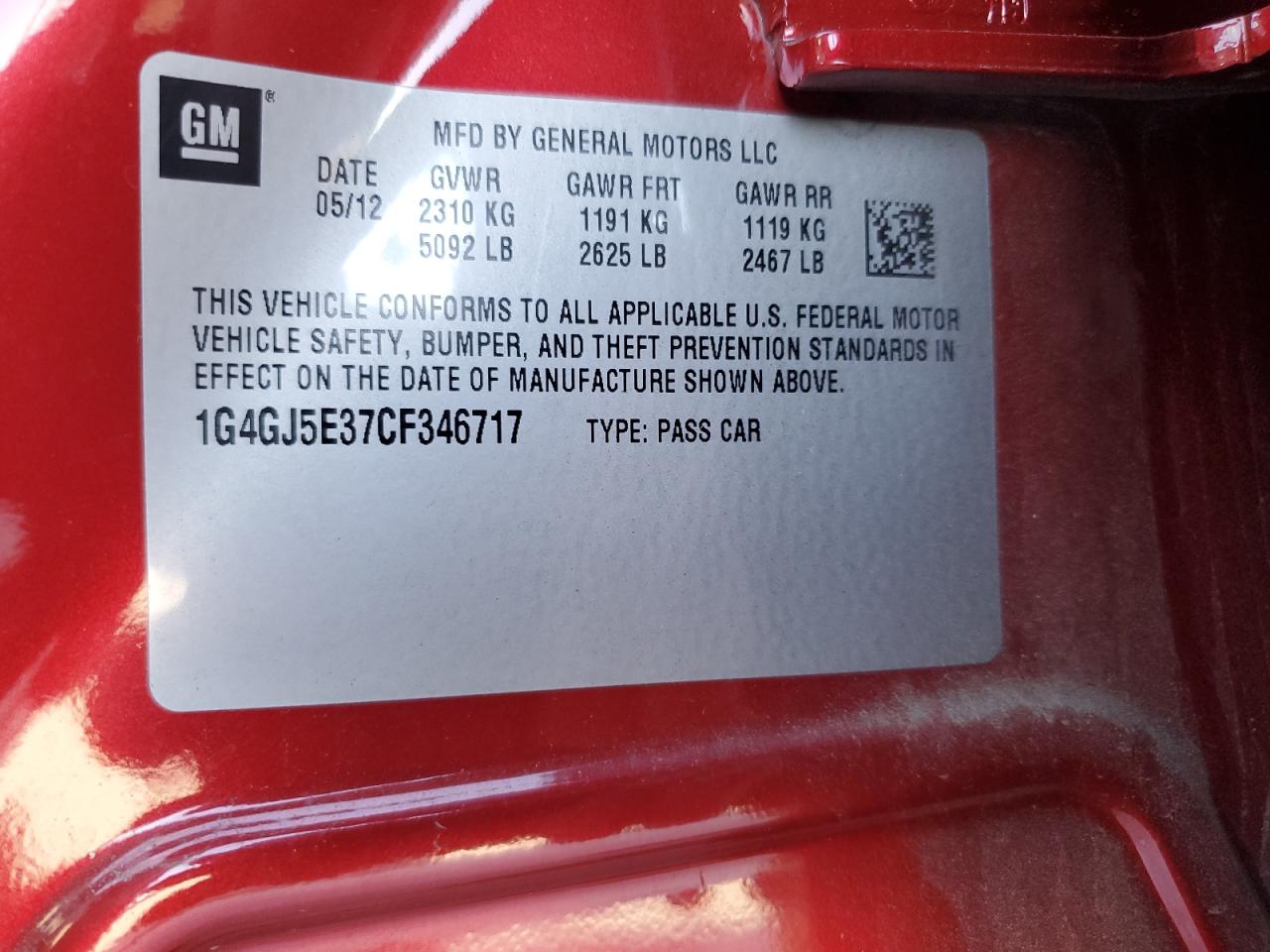 2012 Buick LaCrosse VIN 1G4GJ5E37CF346717 Copart auction photo, side / minor dent/scratches damage thumbnail 12